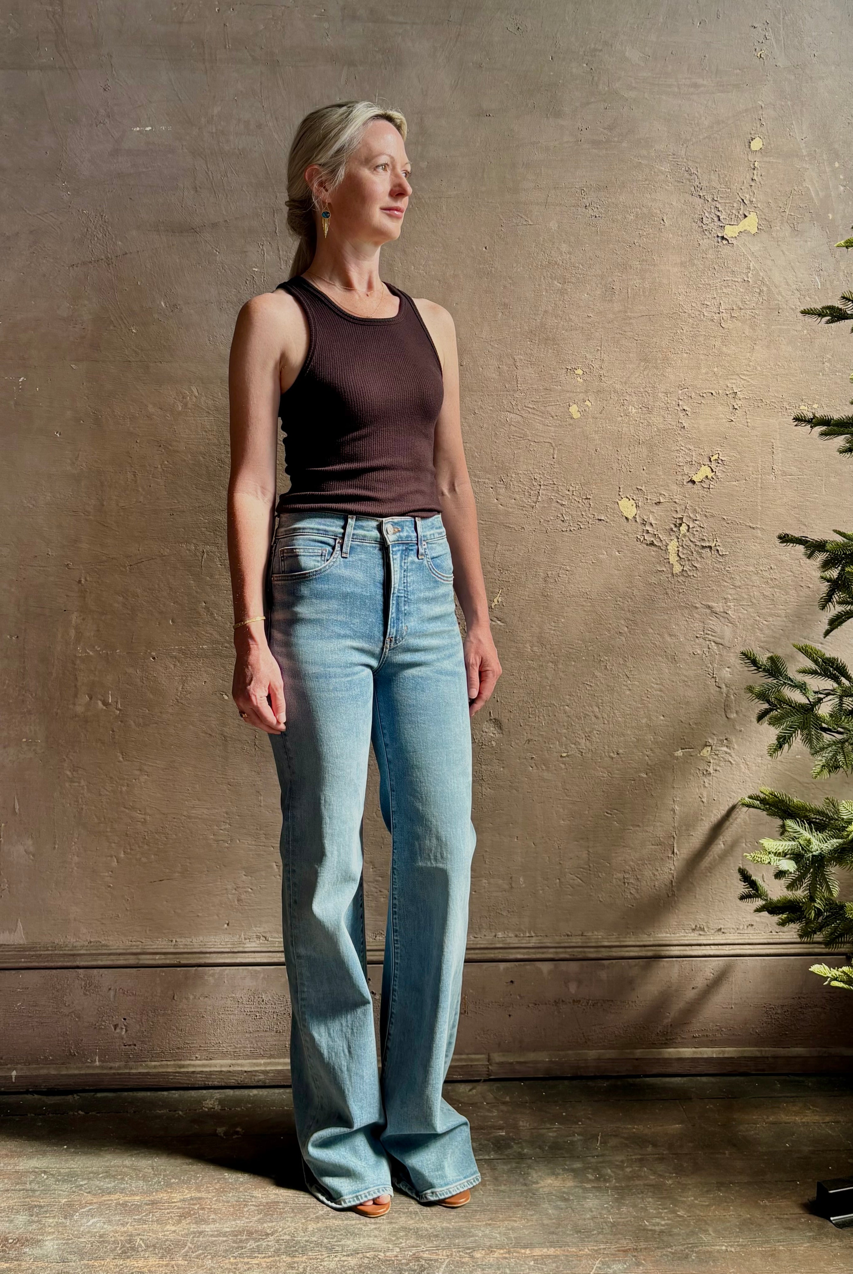 Mature woman wearing American-Made Veronica Beard Crosby Denim High Rise Straight Leg Jean Stretch Medium Wash
