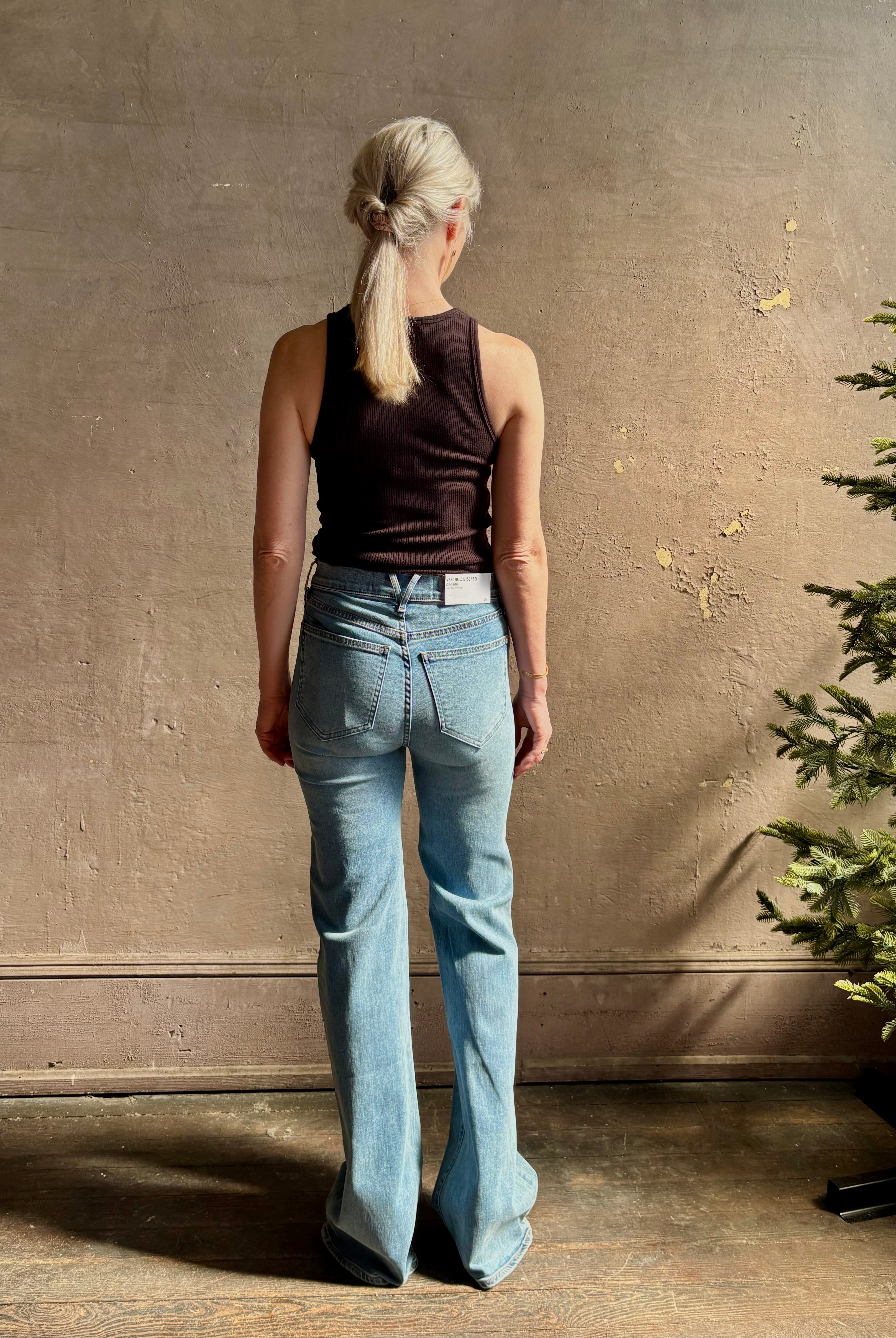 Mature woman wearing American-Made Veronica Beard Crosby Denim High Rise Straight Leg Jean Stretch Medium Wash