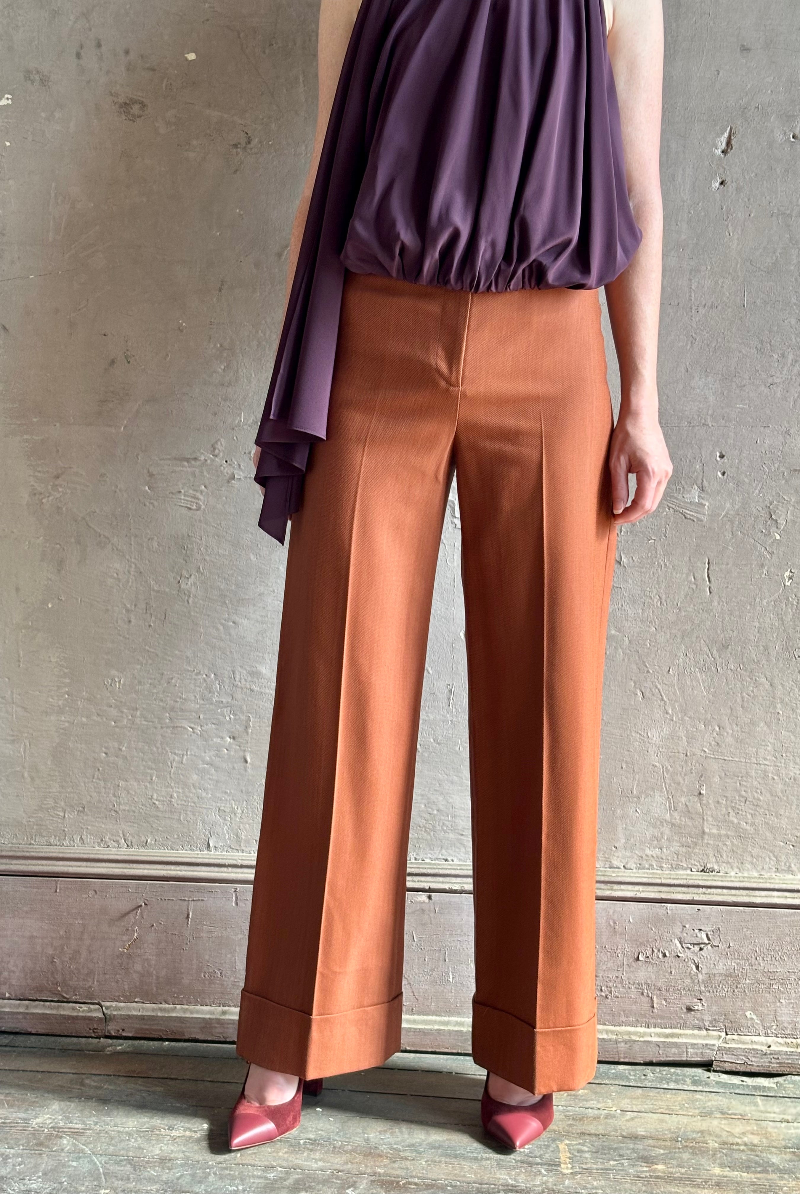 Mature woman wearing Veronica Beard Darell tailored Pant high-rise fitted waist wide leg cropped length