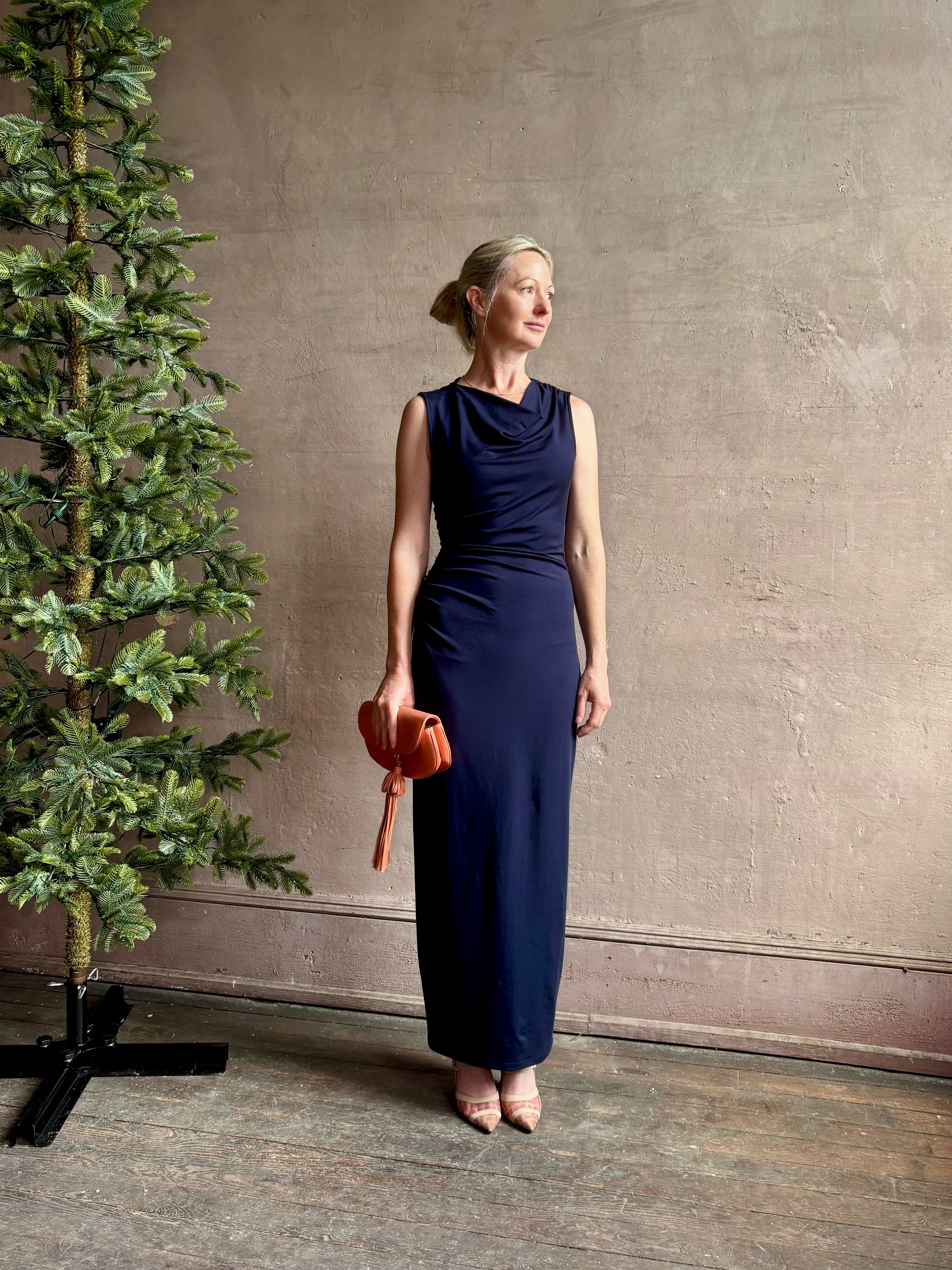 Mature woman wearing VERONICA BEARD Kerilyn navy blue maxi sheath Dress in a comfortable elevated casual wear fabric