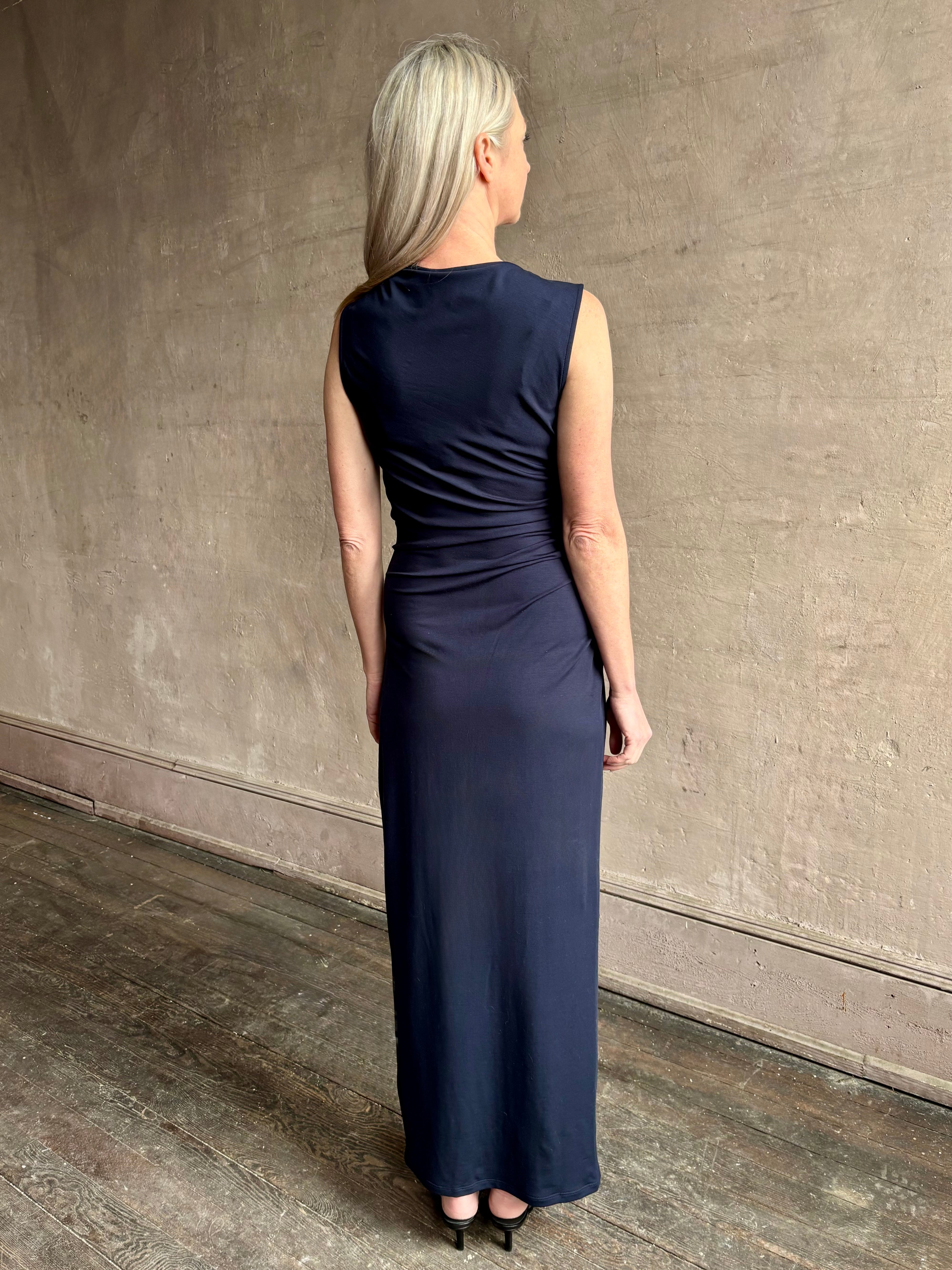 Image of mature woman wearing VERONICA BEARD Kerilyn navy blue sleeveless maxi sheath Dress in a comfortable elevated casual wear fabric
