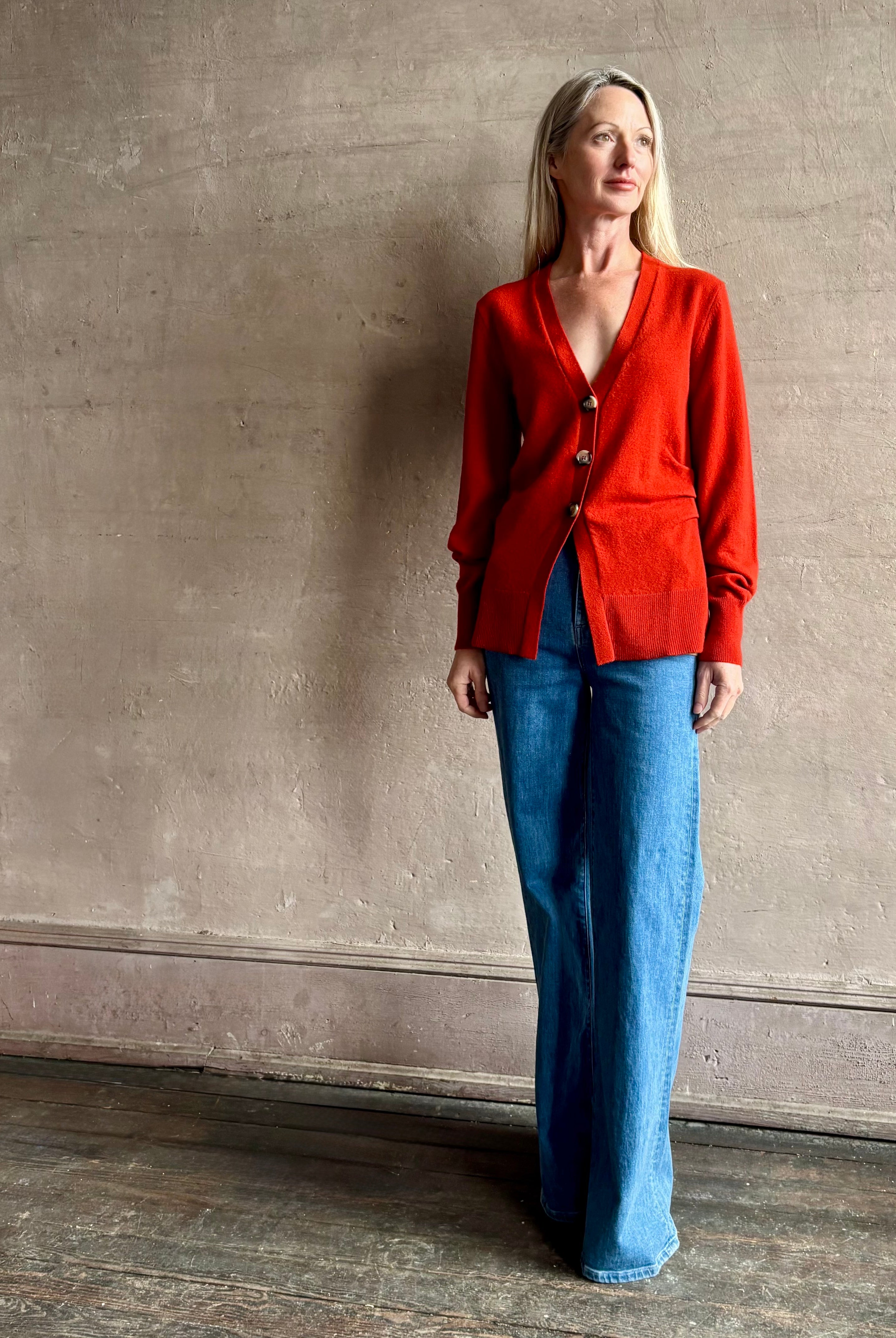 woman wearing VERONICA BEARD Lamotte Cashmere Cardigan with three button closure can be worn alone or layered