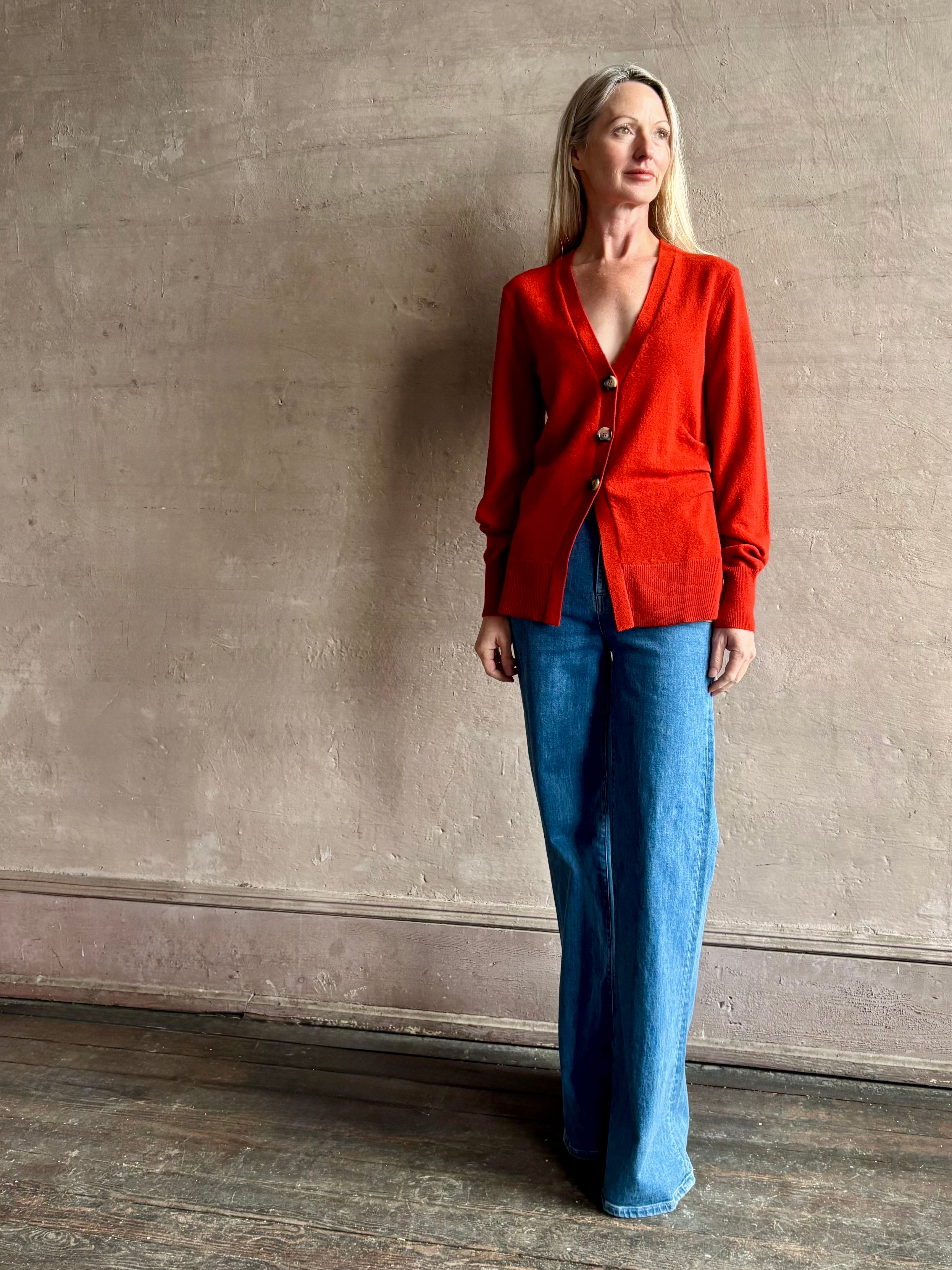 woman wearing VERONICA BEARD Lamotte Cashmere Cardigan with three button closure can be worn alone or layered