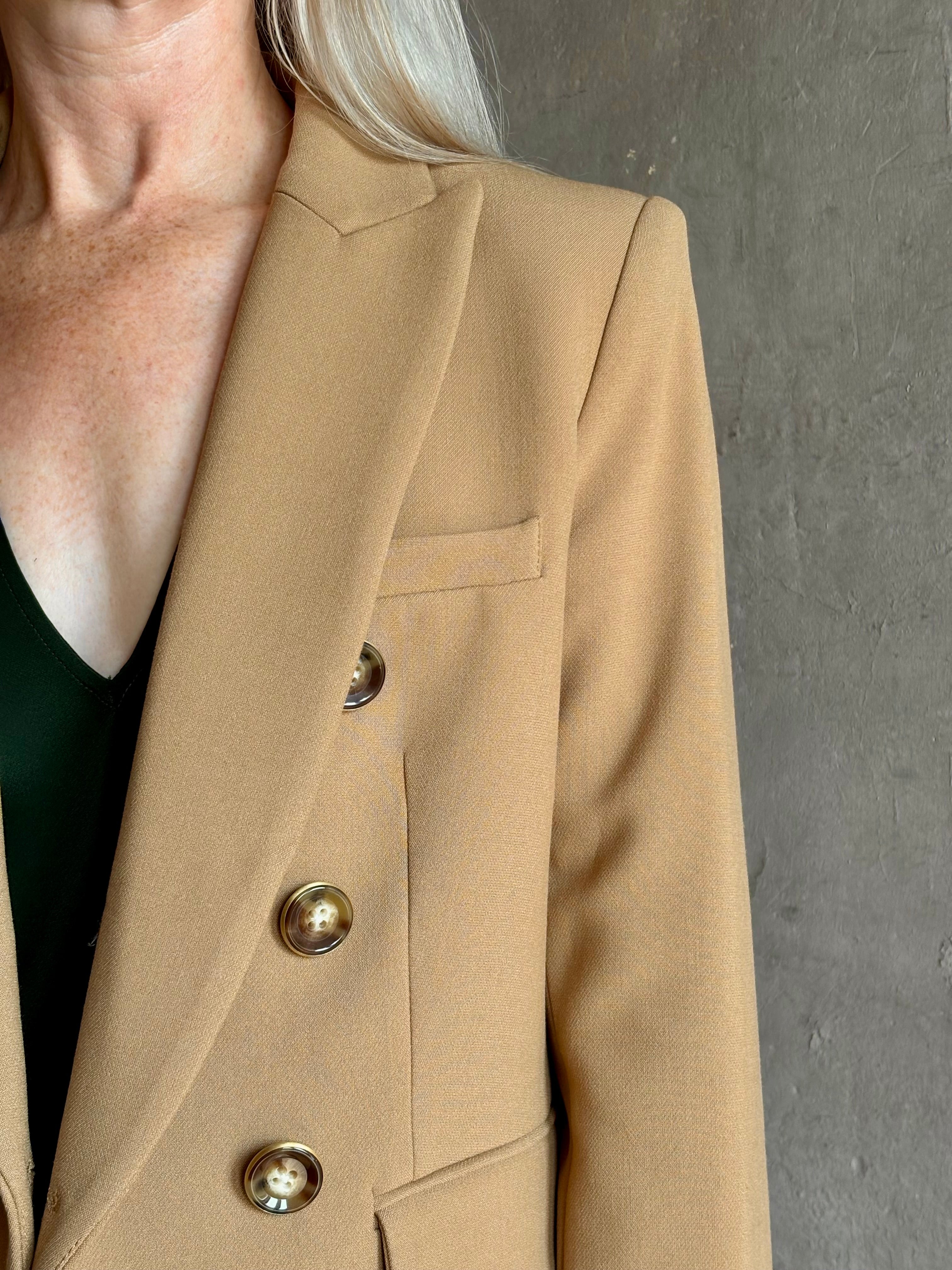 Mature woman wearing Veronica Beard Miller Dickey Jacket in Heritage Khaki tailored blazer flattering back darts