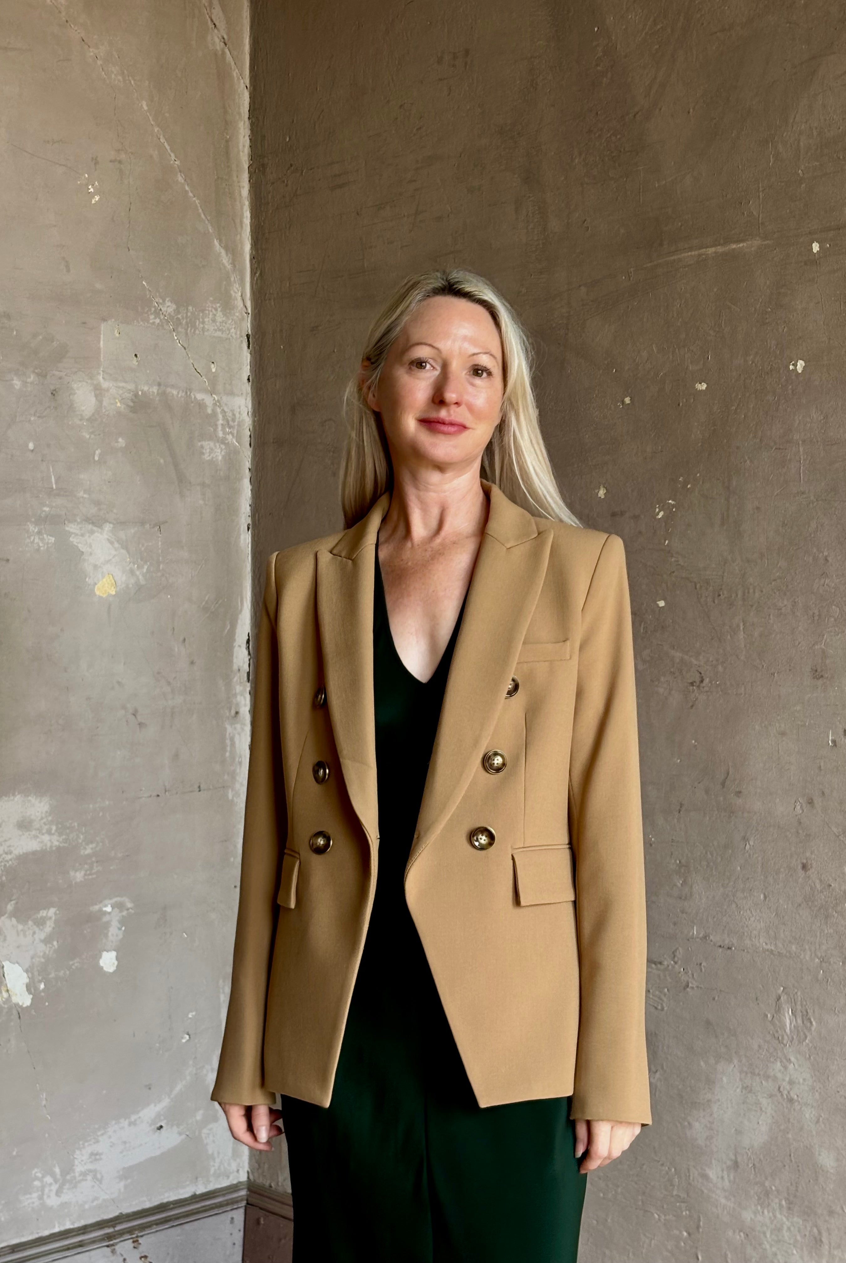 Mature woman wearing Veronica Beard Miller Dickey Jacket in Heritage Khaki tailored blazer flattering back darts