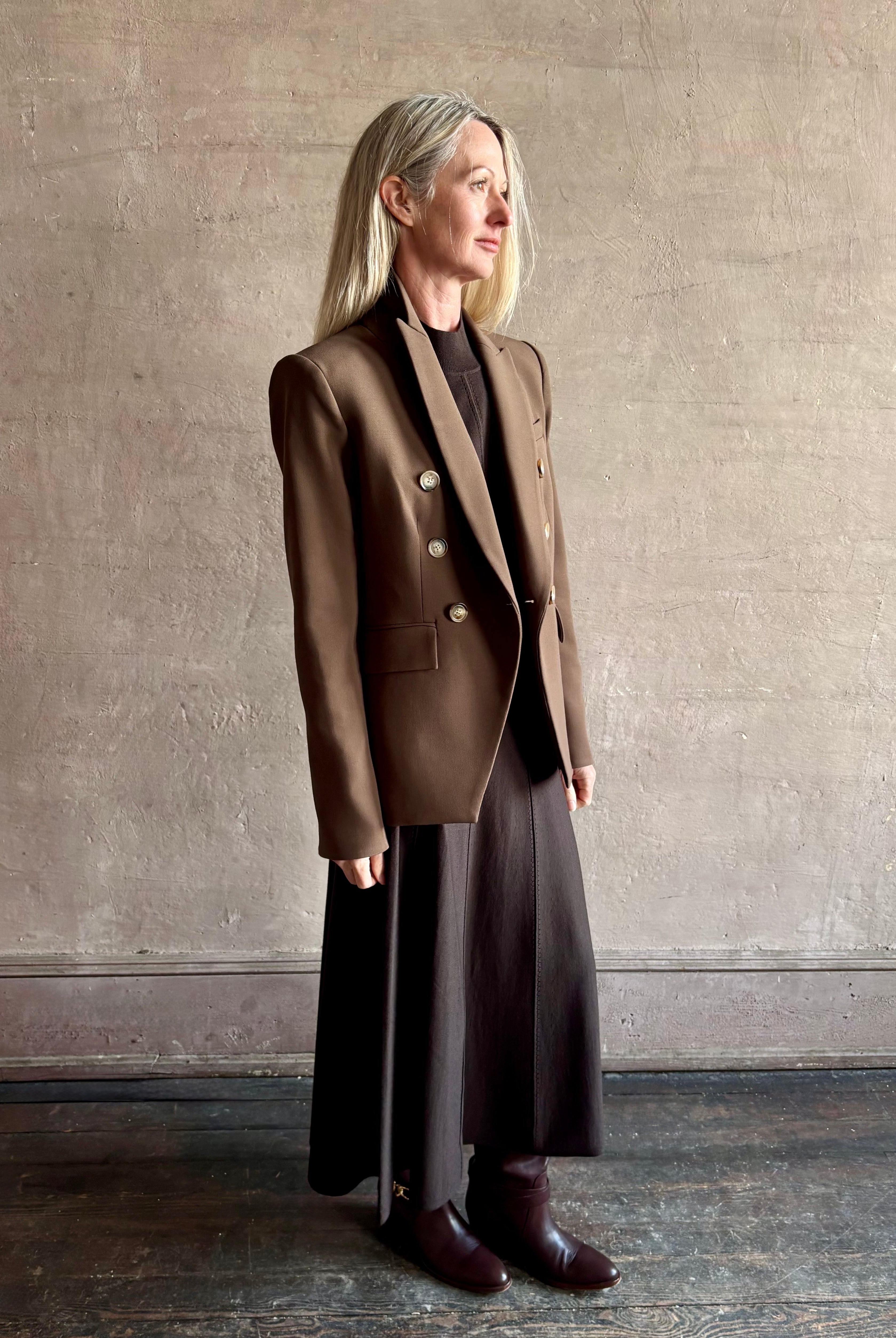 Woman wearing designer VERONICA BEARD tailored Miller Dickey Jacket in Walnut color with neutral buttons