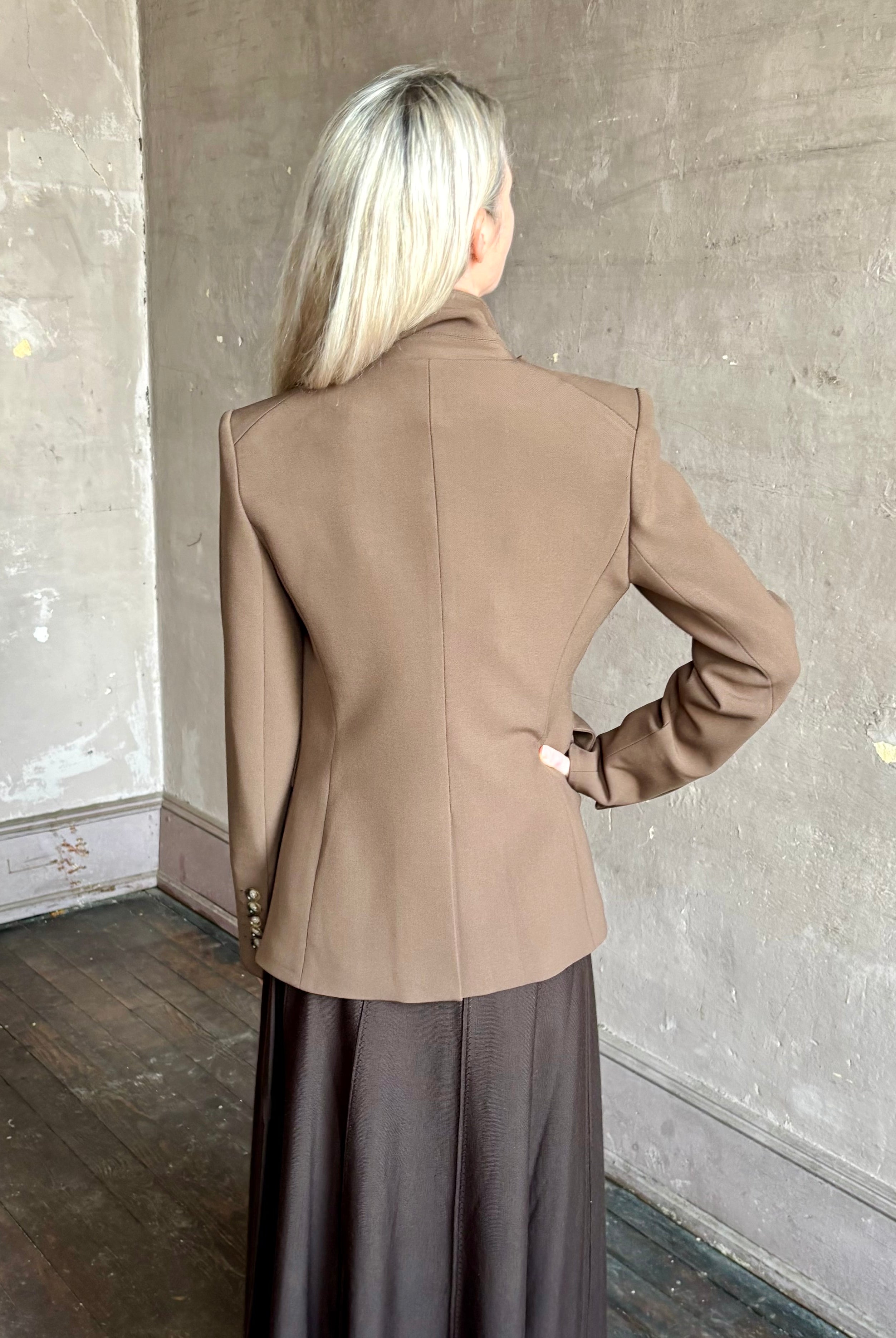 Woman wearing designer VERONICA BEARD tailored Miller Dickey Jacket in Walnut color with neutral buttons