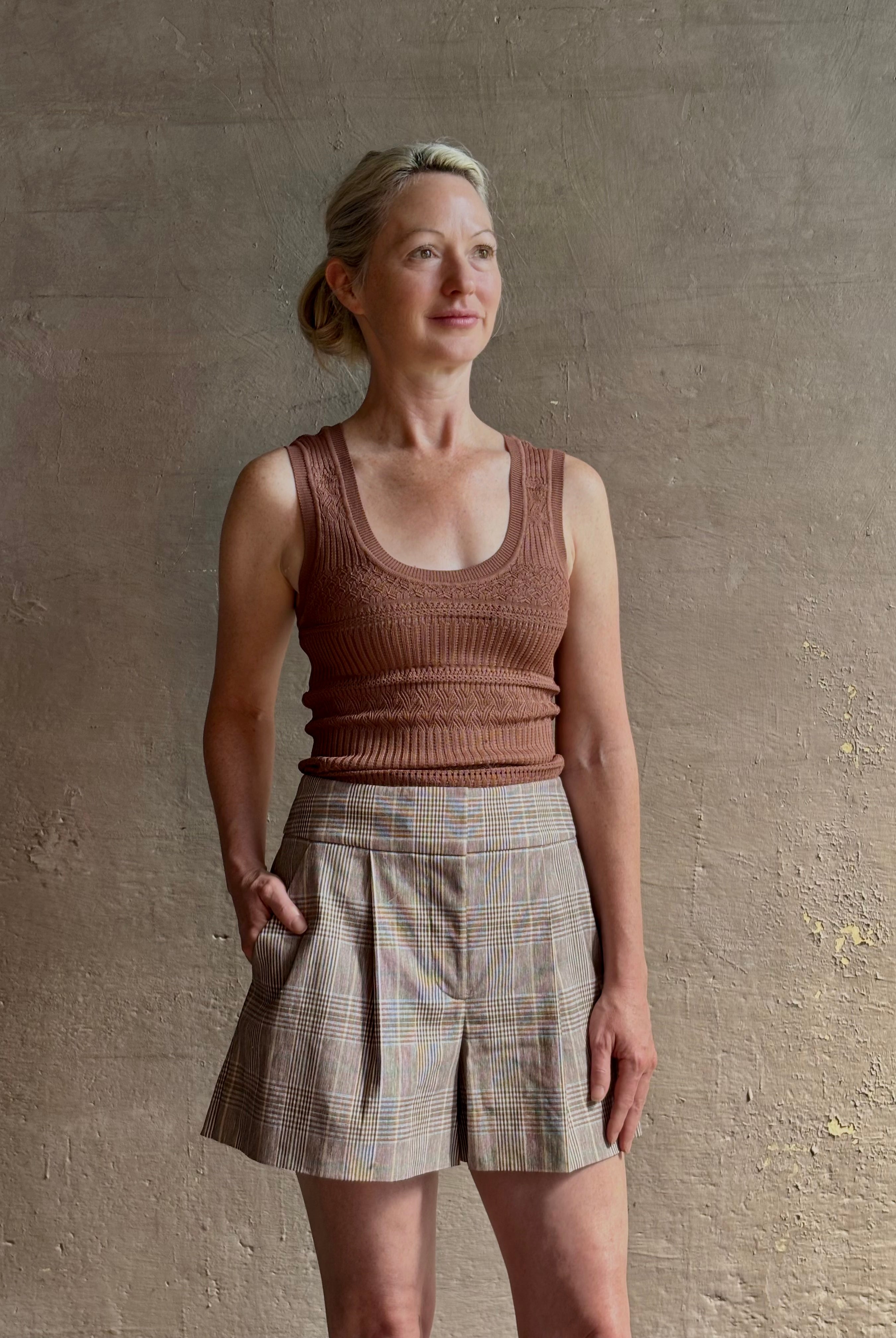 Veronica Beard Sandra Tank Top in a soft neutral nude and crafted from a rayon nylon blend with scoop neckline