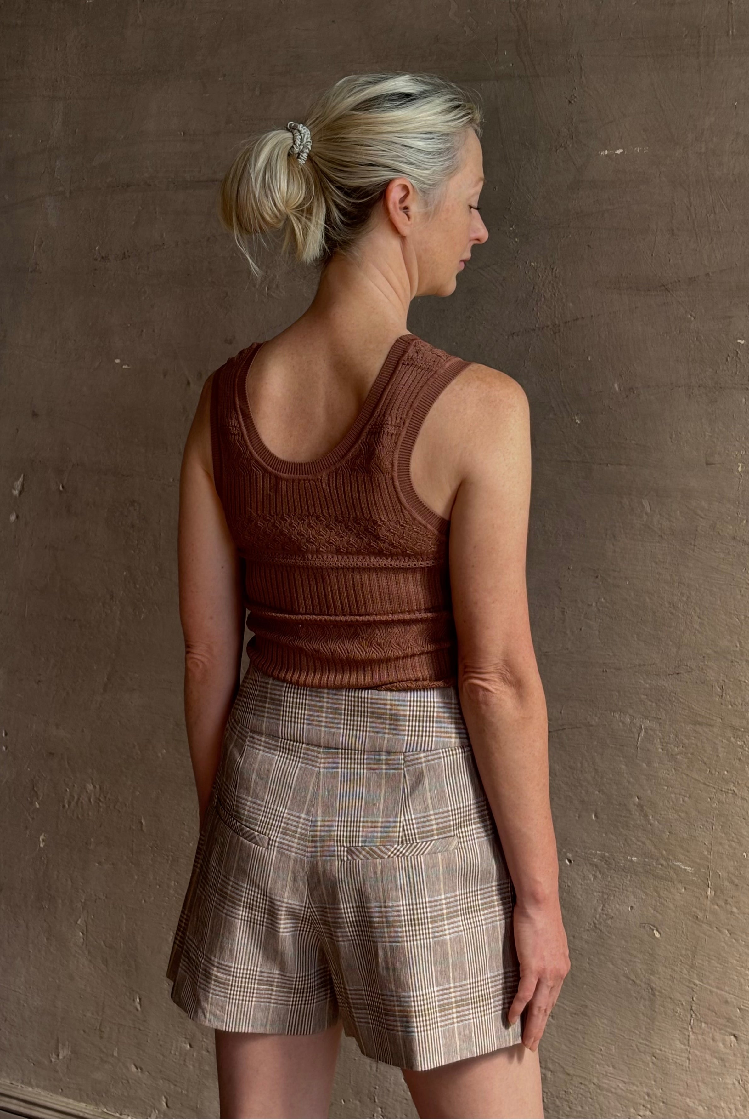 Veronica Beard Sandra Tank Top in a soft neutral nude and crafted from a rayon nylon blend with scoop neckline