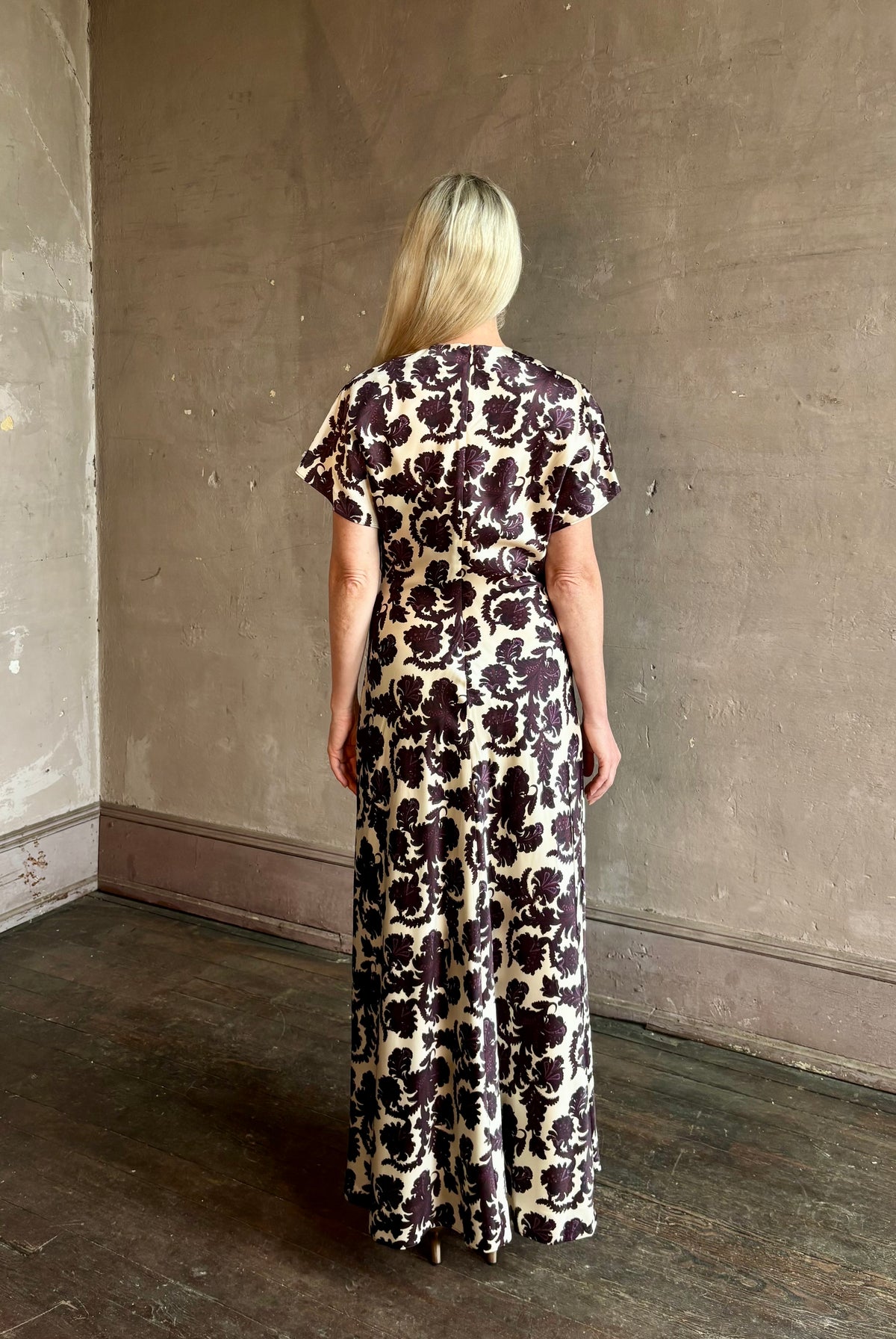 Mature woman wearing designer Veronica Beard V-Neck Redgrave Dress Ecru Multi short sleeves sheath maxi occasion-ready