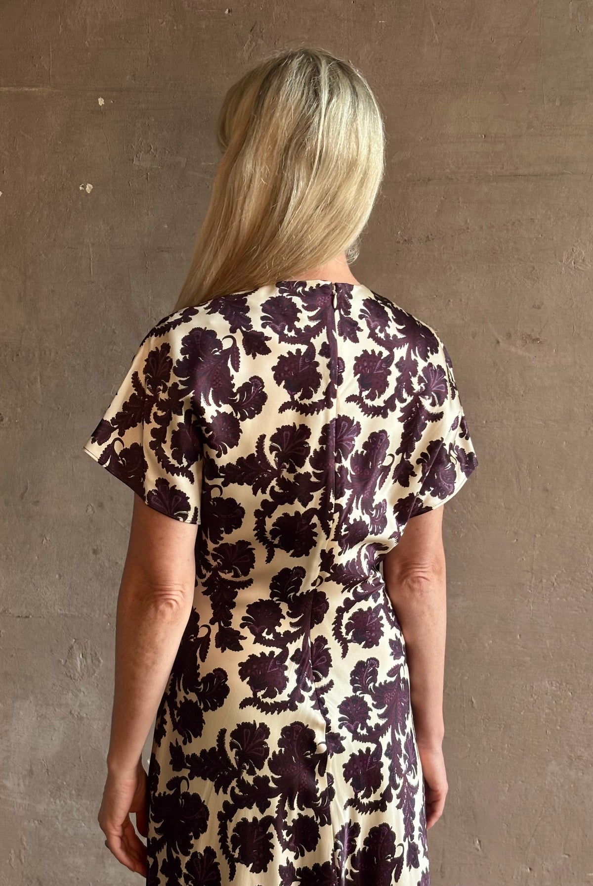 Mature woman wearing designer Veronica Beard V-Neck Redgrave Dress Ecru Multi short sleeves sheath maxi occasion-ready