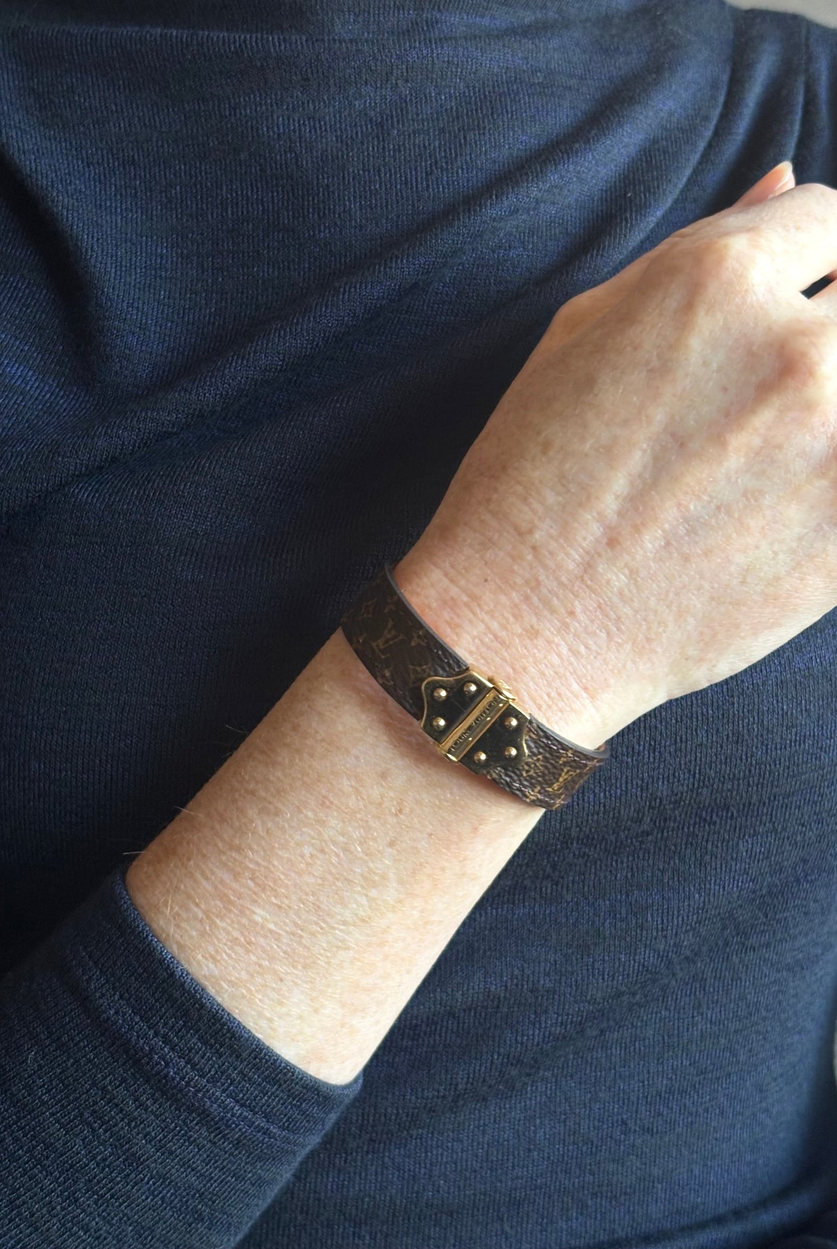 Louis Vuitton Spirit Nano Monogram Bracelet Monogram canvas engraved golden cylinder hinge closure Pre-owned