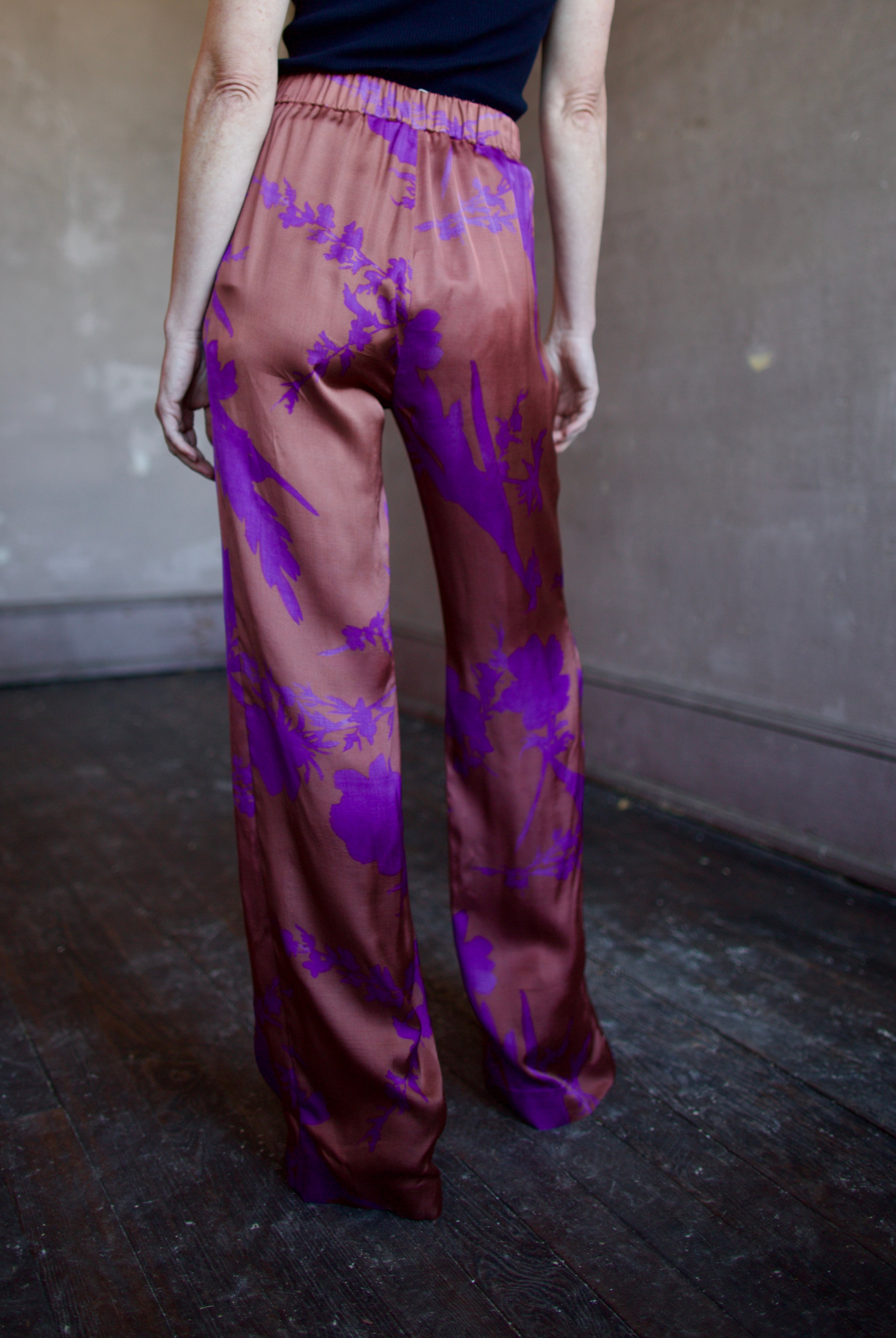 Image of woman wearing luxury brand Vanessa Bruno Cliff floral printed viscose pants features elastic waist, straight leg, side pockets and relaxed fit