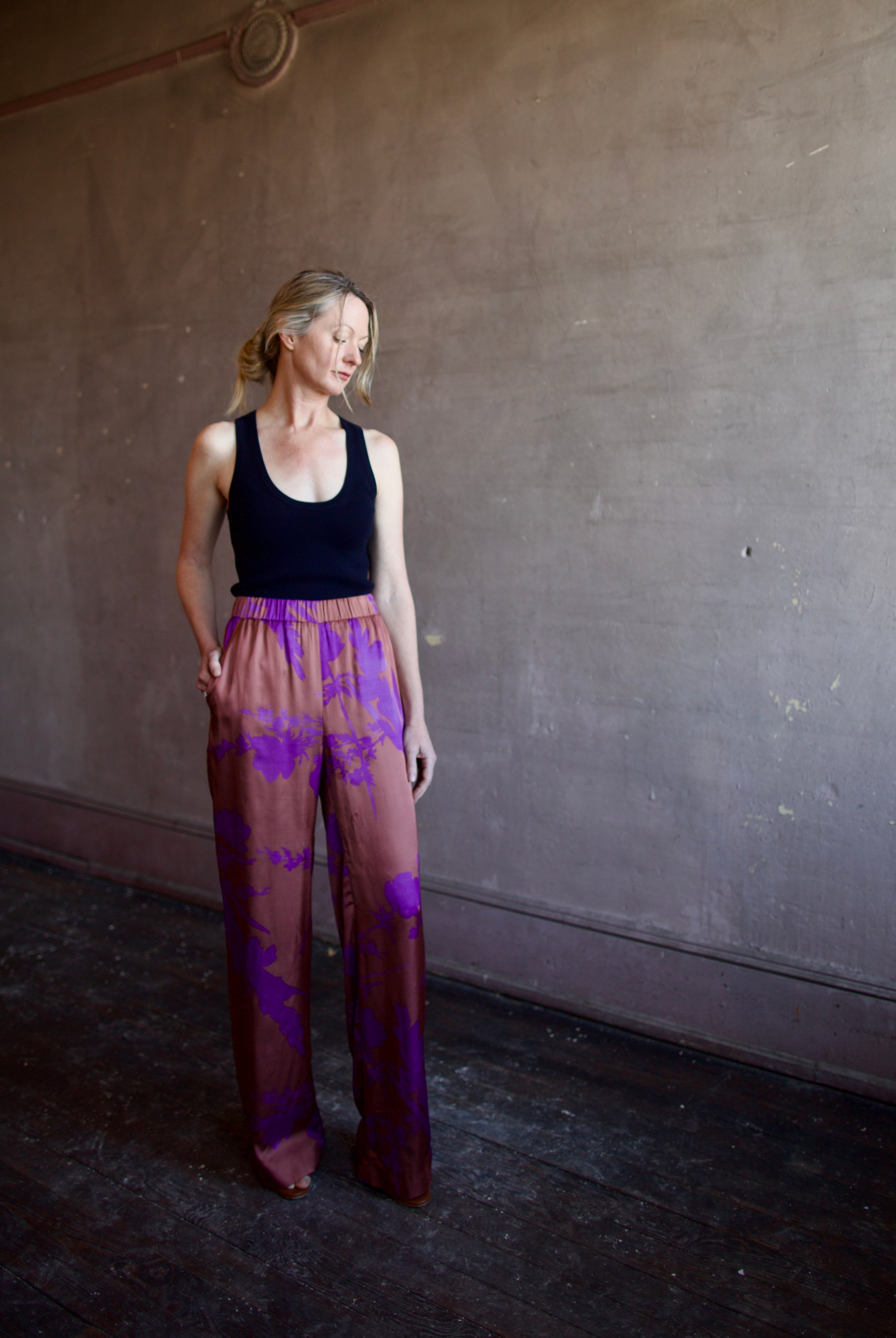 Image of woman wearing luxury brand Vanessa Bruno Cliff floral printed viscose pants features elastic waist, straight leg, side pockets and relaxed fit