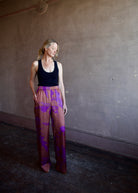 Image of woman wearing luxury brand Vanessa Bruno Cliff floral printed viscose pants features elastic waist, straight leg, side pockets and relaxed fit