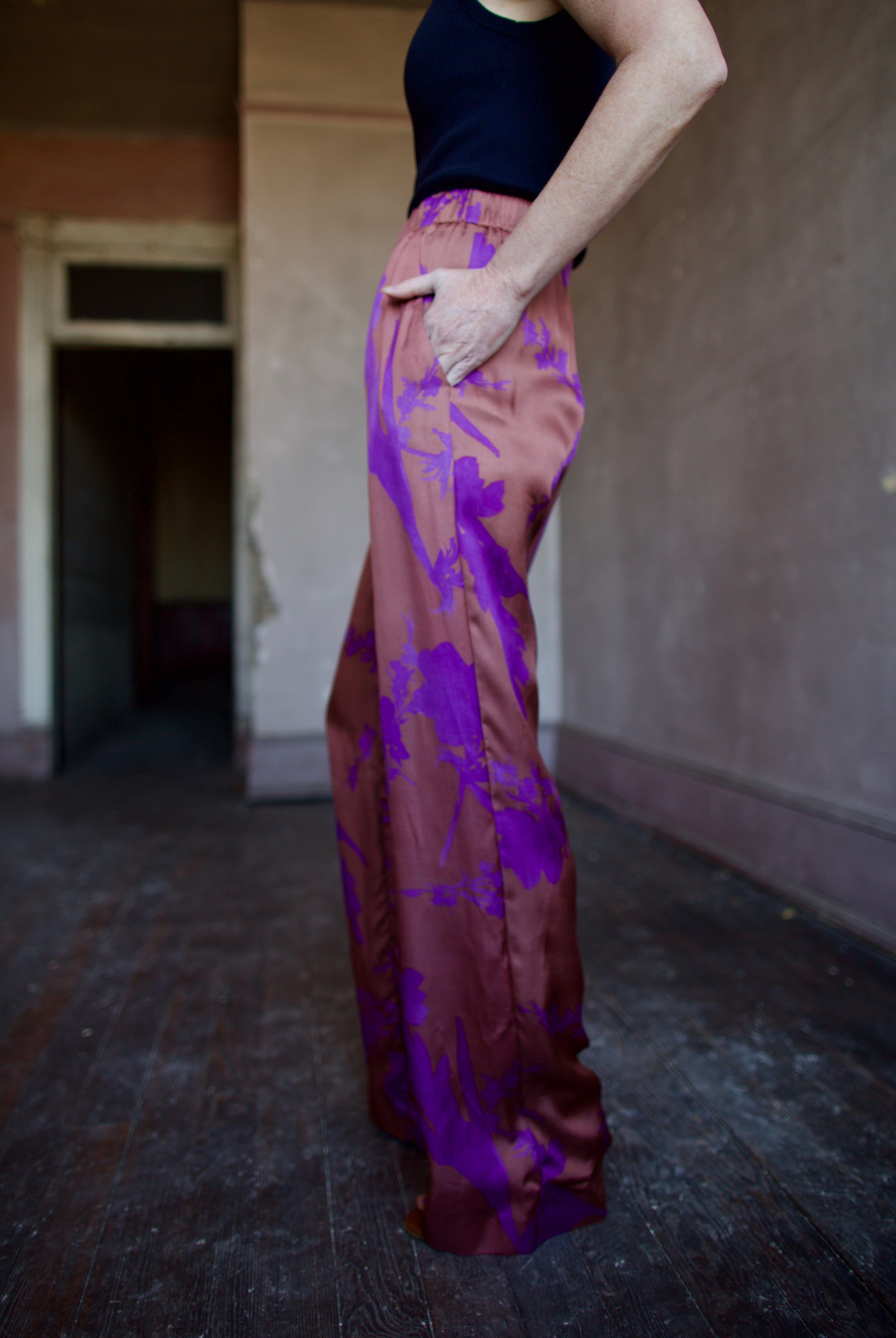 Image of woman wearing luxury brand Vanessa Bruno Cliff floral printed viscose pants features elastic waist, straight leg, side pockets and relaxed fit