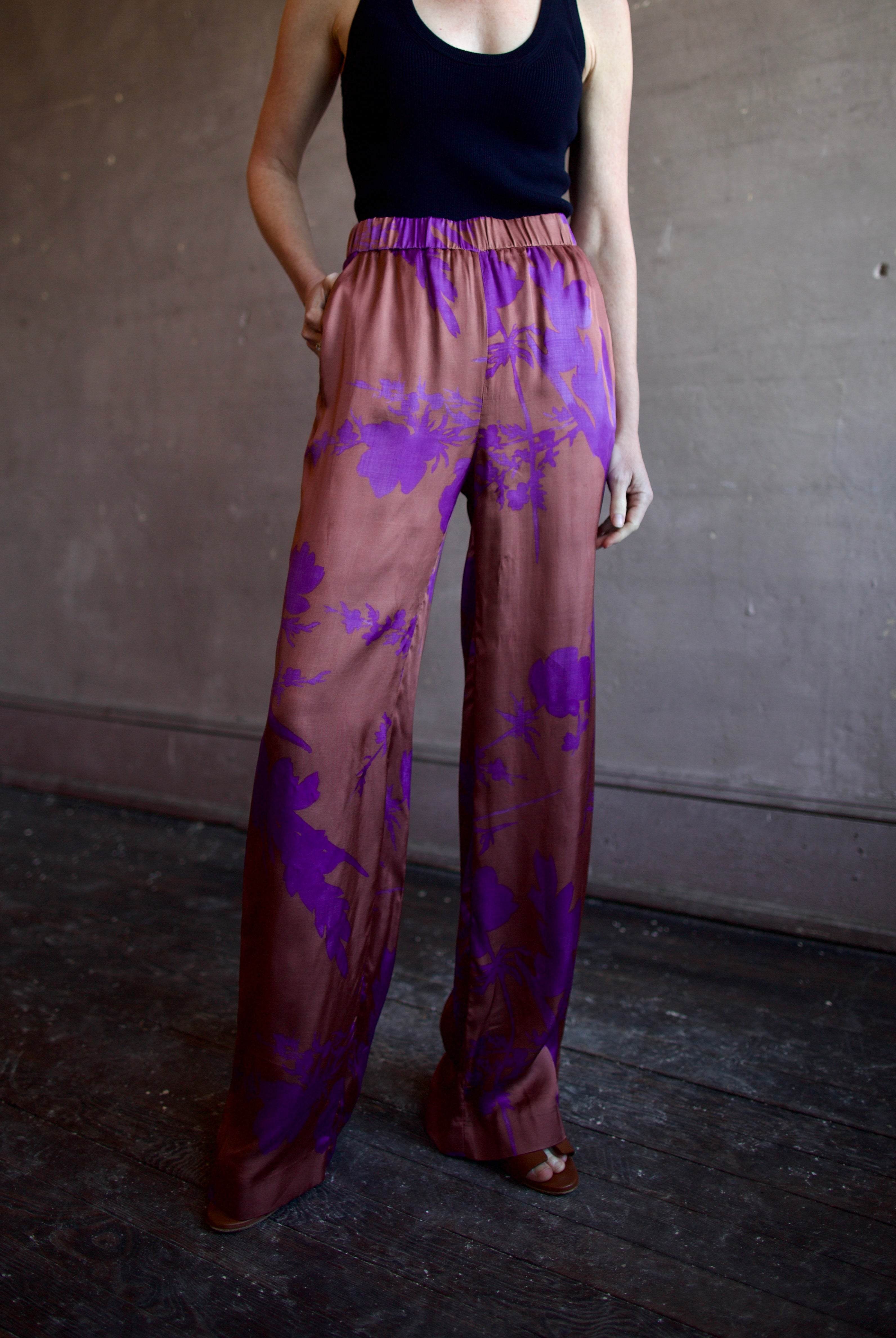 Image of woman wearing luxury brand Vanessa Bruno Cliff floral printed viscose pants features elastic waist, straight leg, side pockets and relaxed fit