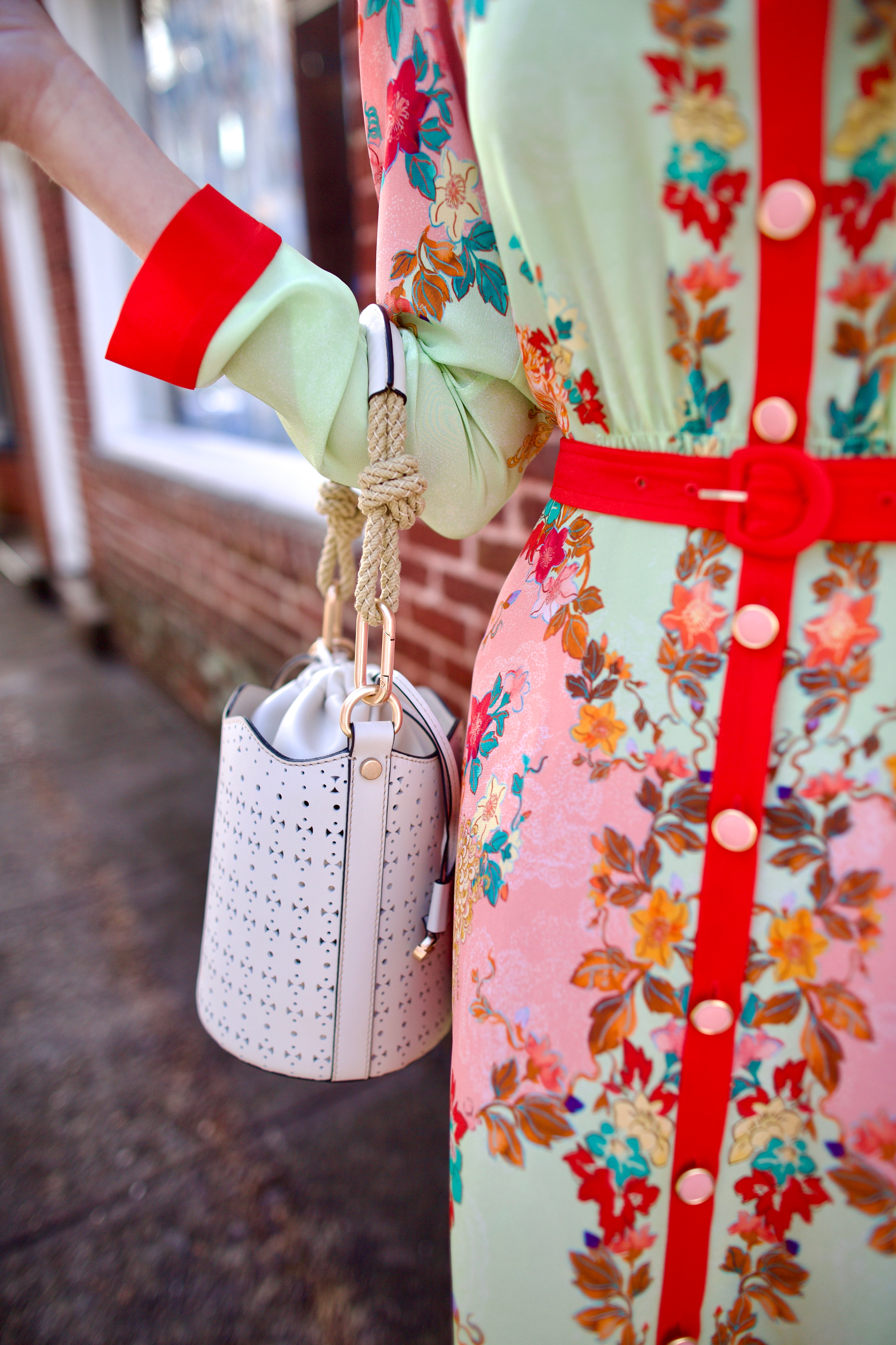 Image of designer vanessa bruno holly mini seau ivory handbag with premium perforated leather construction and modern elegance