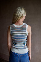 Model wearing the Veronica Beard Ezinna cotton Knit Tank top in casual dove colorway with flattering scoop neckline