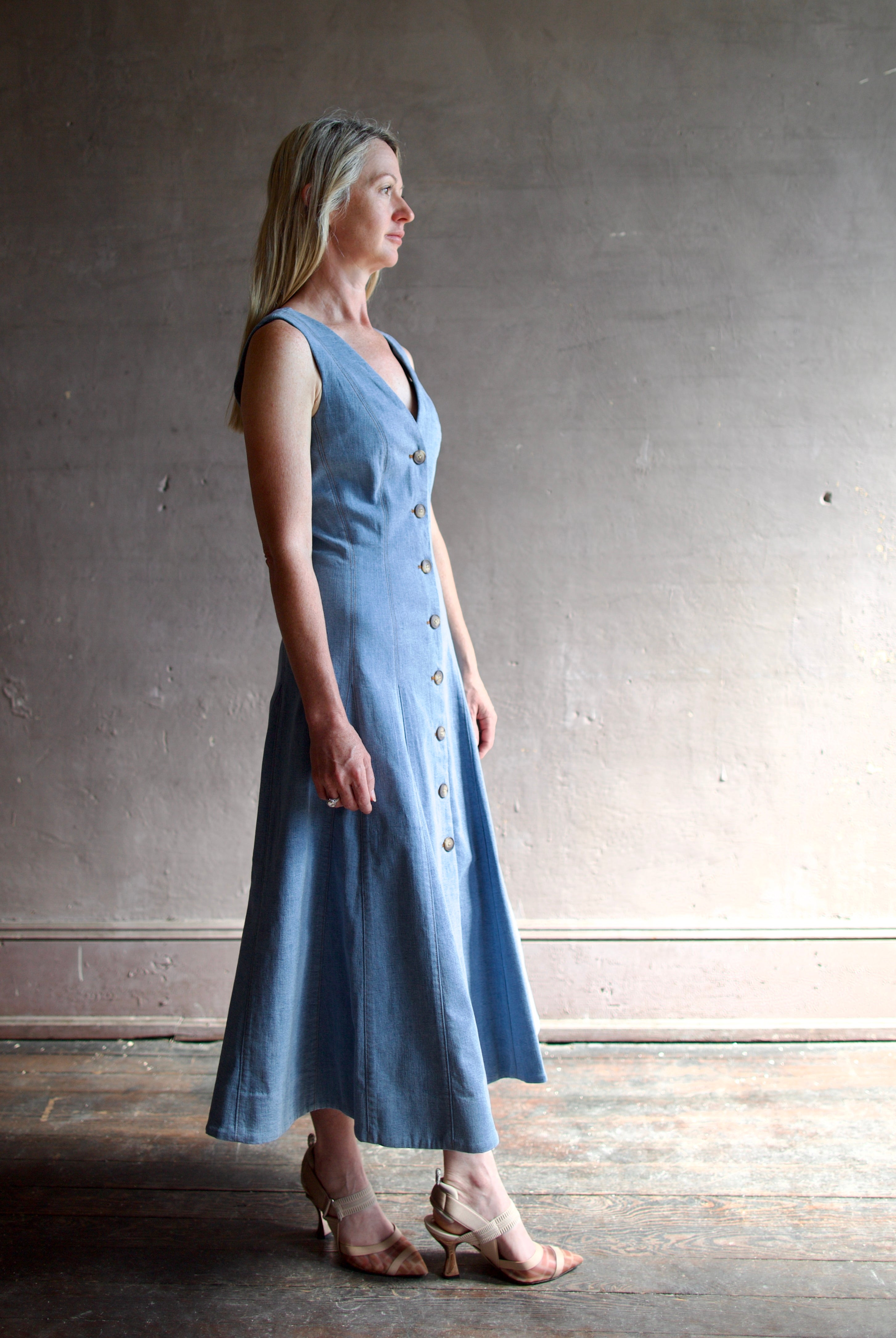 Model wearing Veronica Beard Lou Dress in blue mirage with classic tailored design to accent an amazing feminine silhouette
