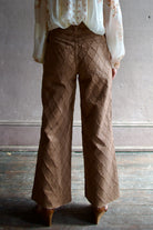 Model wearing the premium Veronica Beard Taylor Cropped Jeans in Hazelnut stone elevated neutral with sophisticated lattice texture