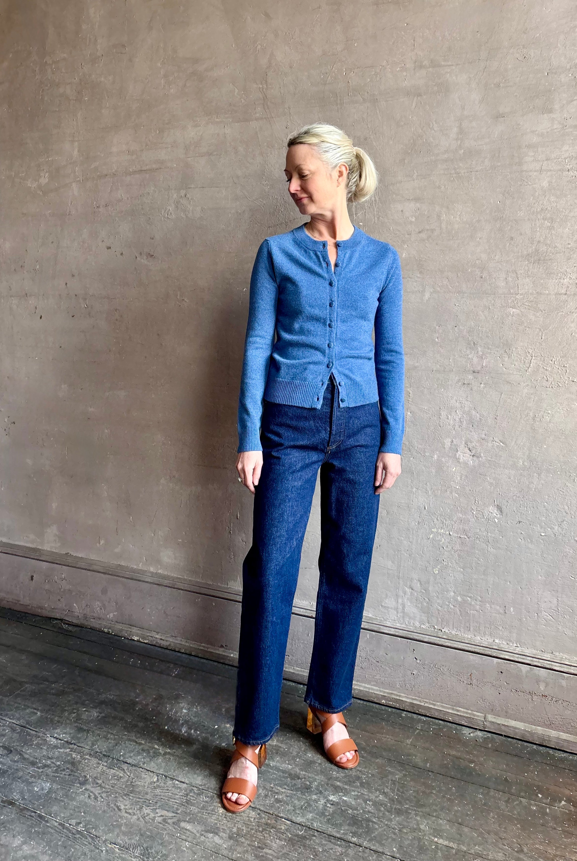 woman wearing designer Veronica Beard Daro Cashmere Cardigan in Blue Coast Melange with long sleeves and crew neck