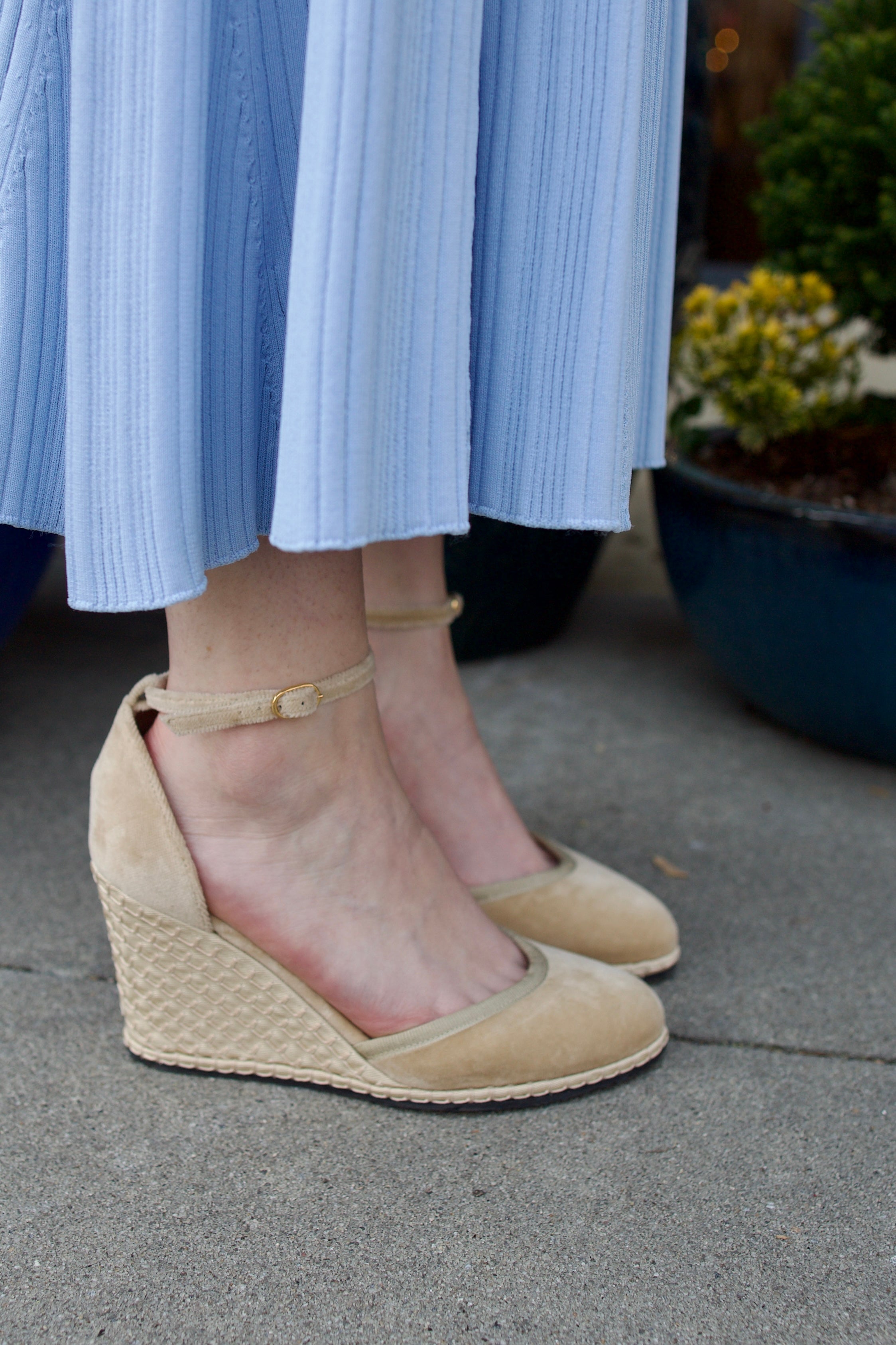 A pair of beige Vibi espadrille wedge heels in beautiful neutral velvet with ankle straps and buckle closures.