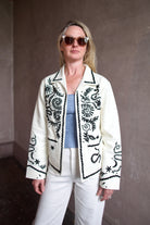 Model wearing the Alix of Bohemia Francis Bone Snake Jacket in black and white colorway with luxury fiber quality and Bohemian refinement