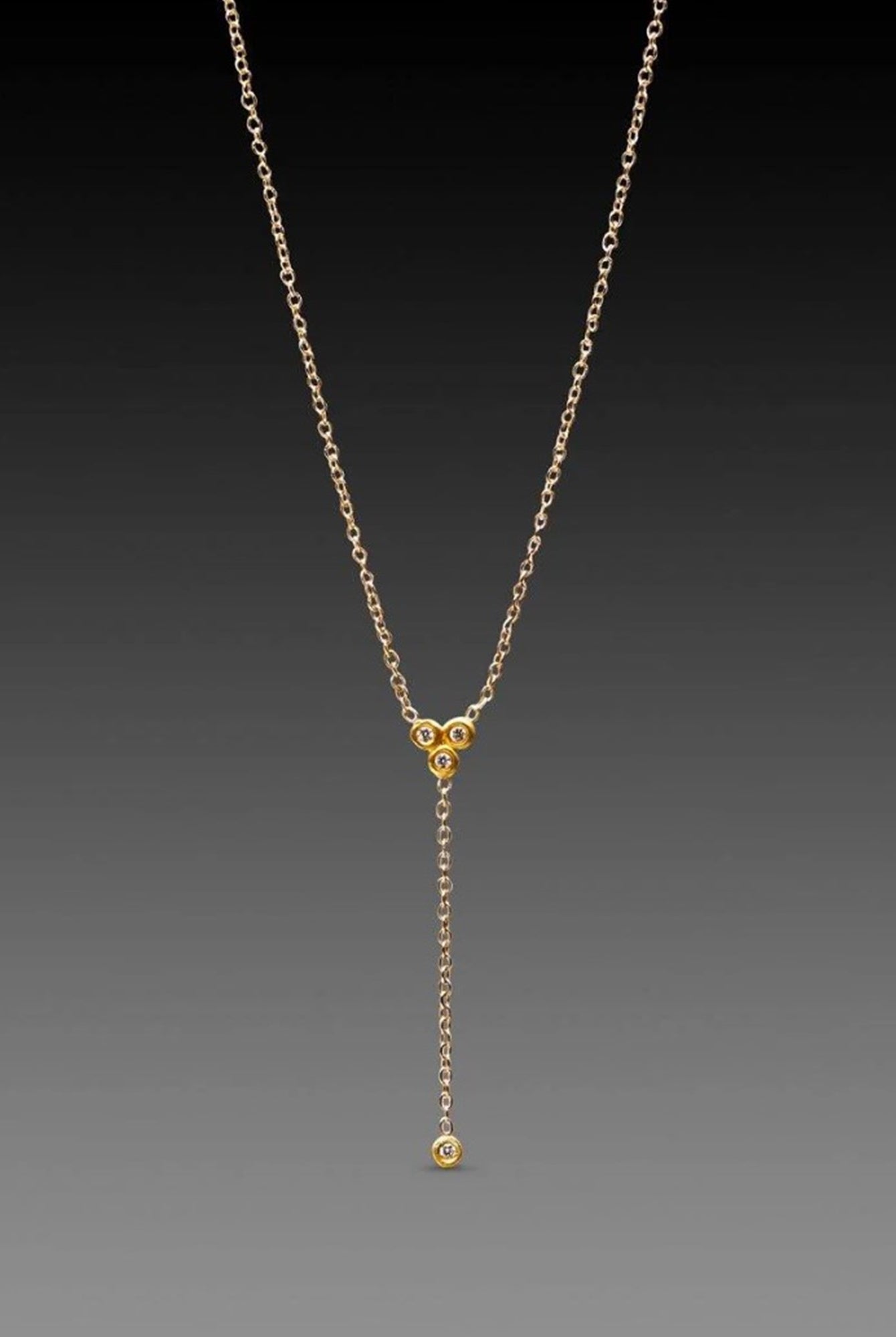Image of Ananda Khalsa Delicate Diamond Trio Necklace featuring white diamonds 22kt yellow gold bezel with 22kt diamond drop on an 14kt gold chain