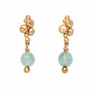 Image of artist Julie Cohn earrings features bronze cast bubbles with fluorite stone drops on gold filled posts