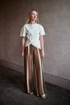 Image of a woman wearing the Rag and Bone Olivia Linen Pants and Mica Tee