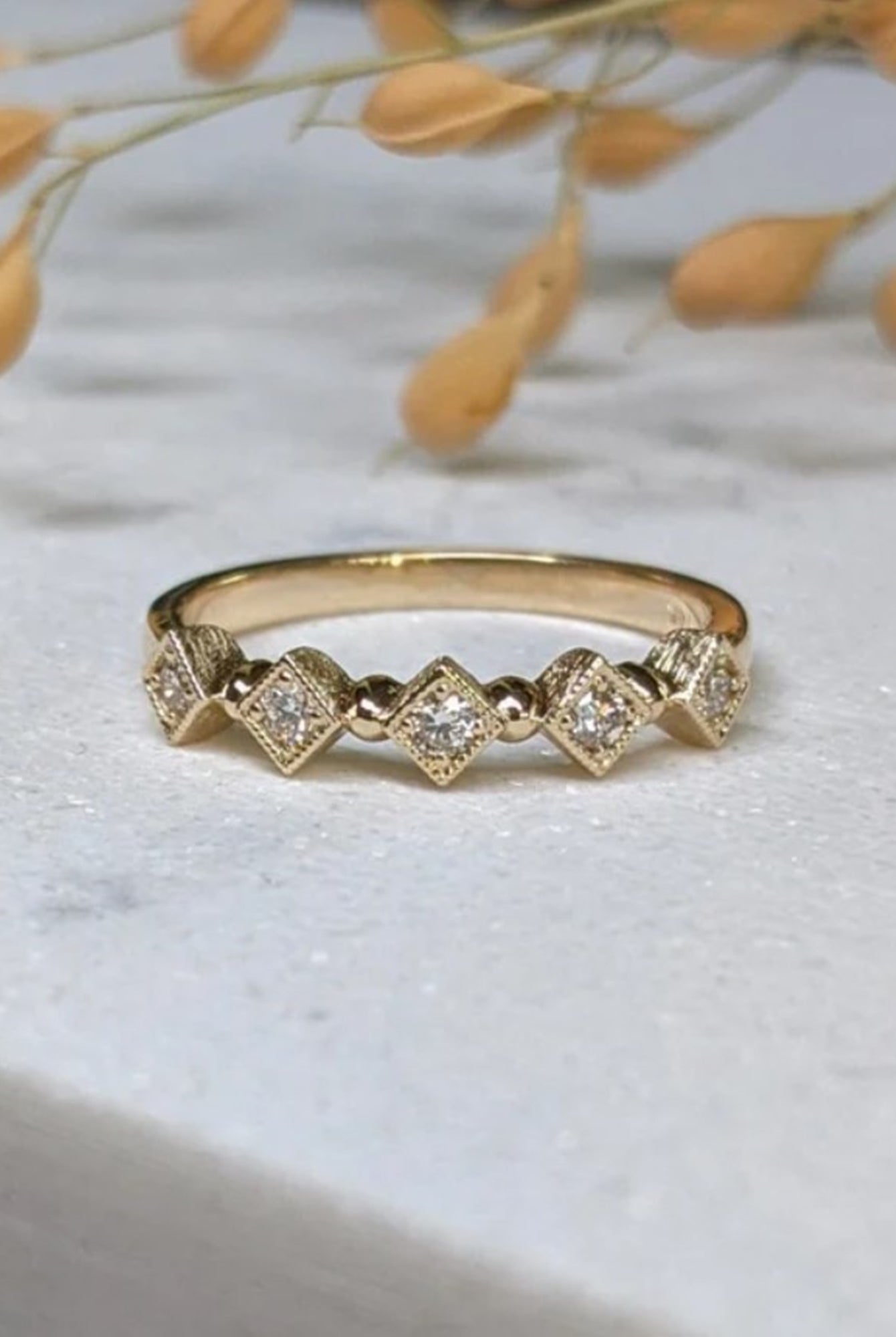 Image of Asheville jeweler Stephanie Ellis 14k yellow gold band classically designed ring with five premium round brilliant natural diamonds