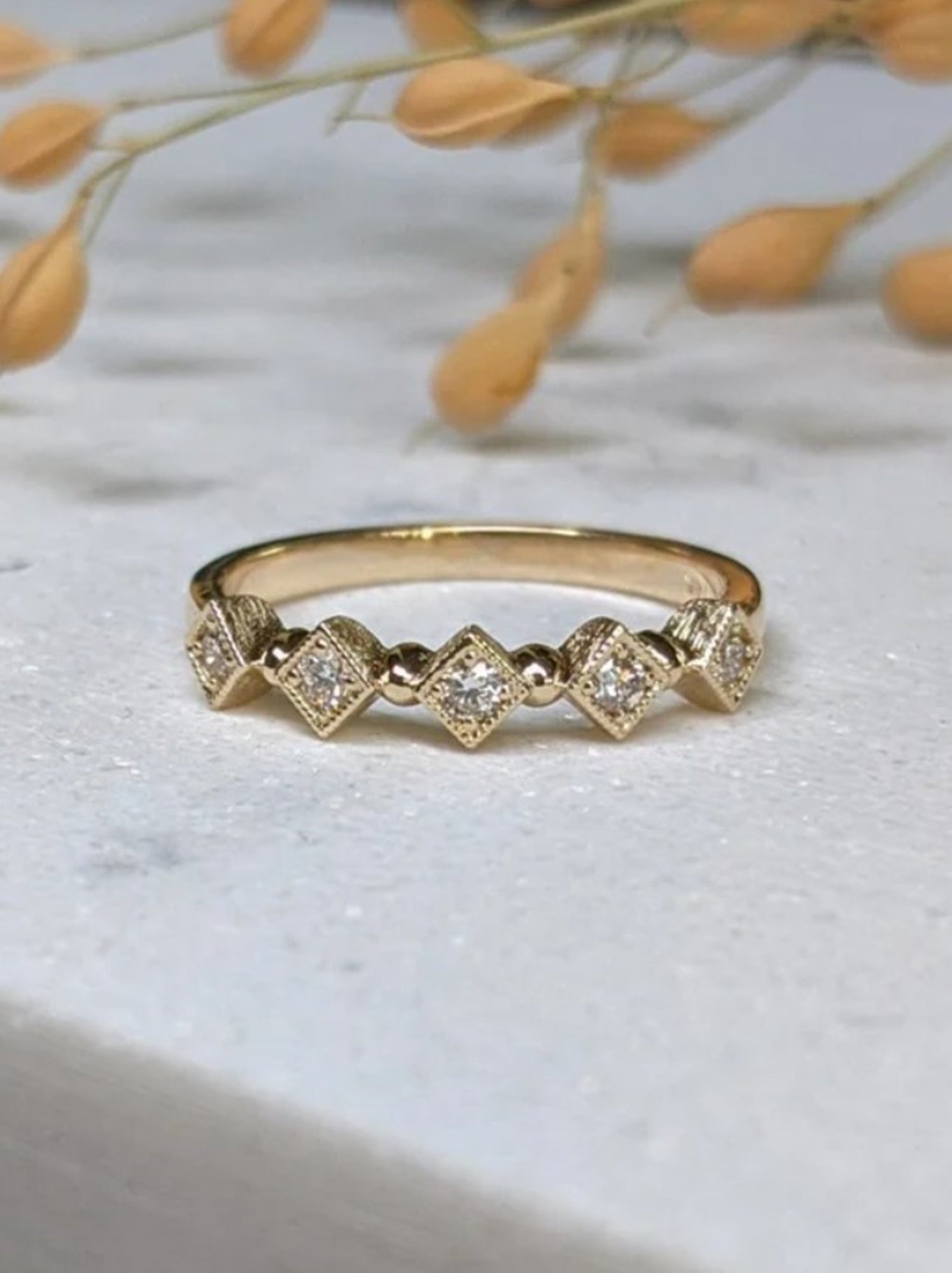 Image of Asheville jeweler Stephanie Ellis 14k yellow gold band classically designed ring with five premium round brilliant natural diamonds