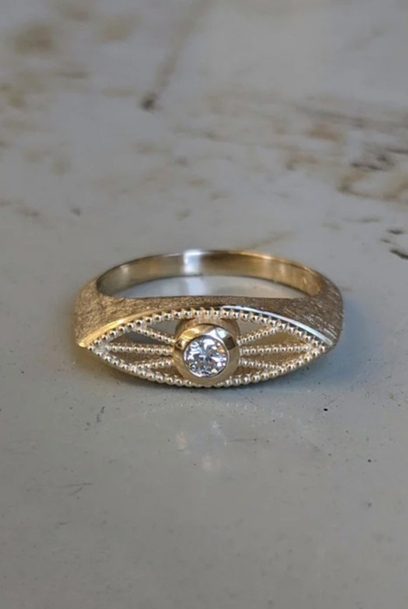 Image of Asheville jewelry designer STEPHANIE ELLIS Deco Eye Signet Ring in 14K Recycled Yellow Gold Diamond Fine Jewelry