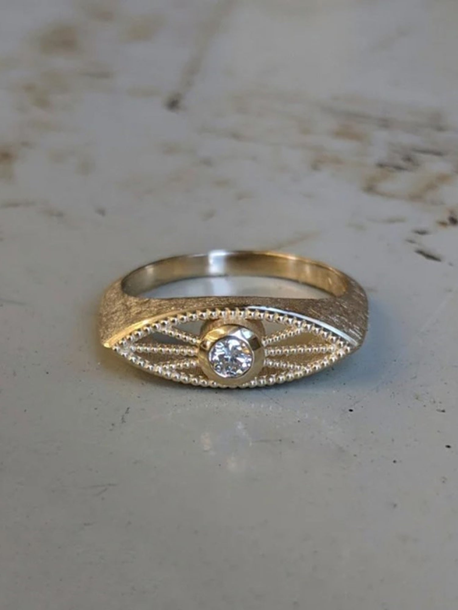 Image of Asheville jewelry designer STEPHANIE ELLIS Deco Eye Signet Ring in 14K Recycled Yellow Gold Diamond Fine Jewelry