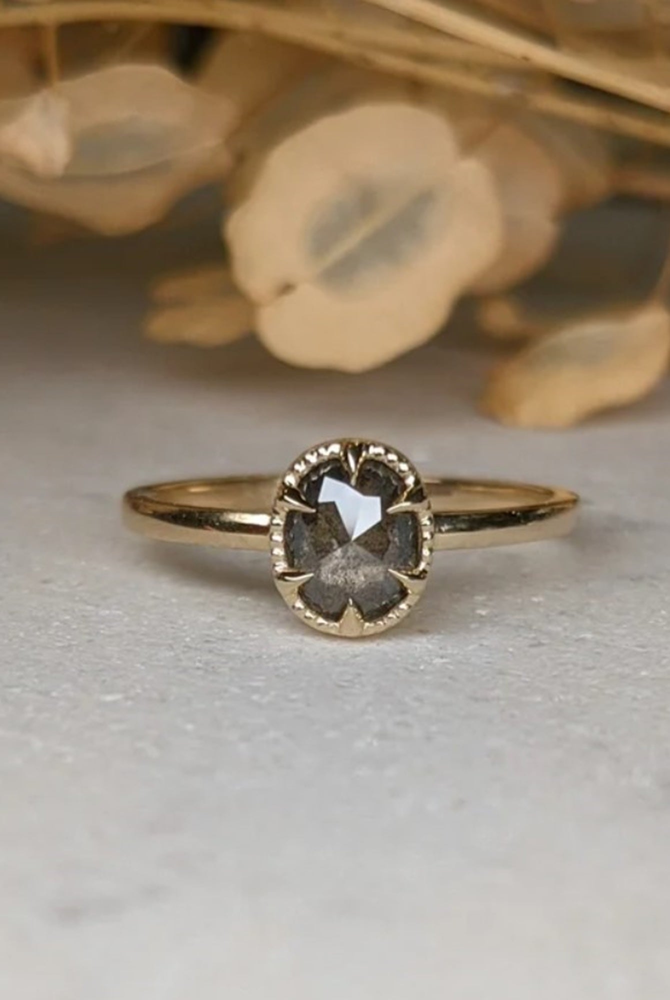 Image of luxury Asheville jeweler STEPHANIE ELLIS Oval Stacker Ring in 14K Recycled Yellow Gold Salt and Pepper Diamond