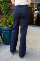 Woman wearing the ALC Simon Pants with refined sophistication through premium cotton blend construction and contemporary straight leg design