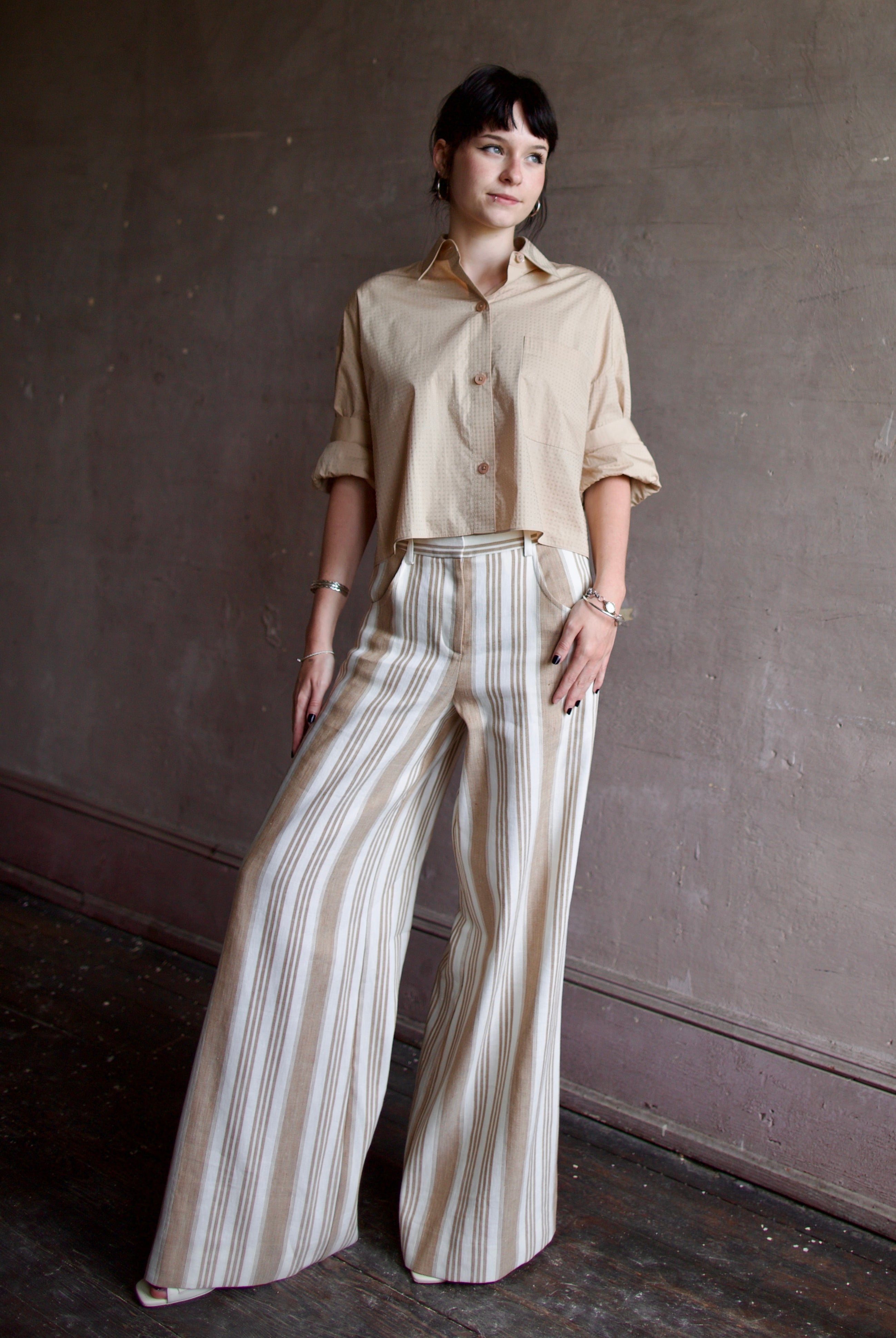 Image of a woman wearing the Next Ex Top with Crystals and Demie Trousers with Pintucks