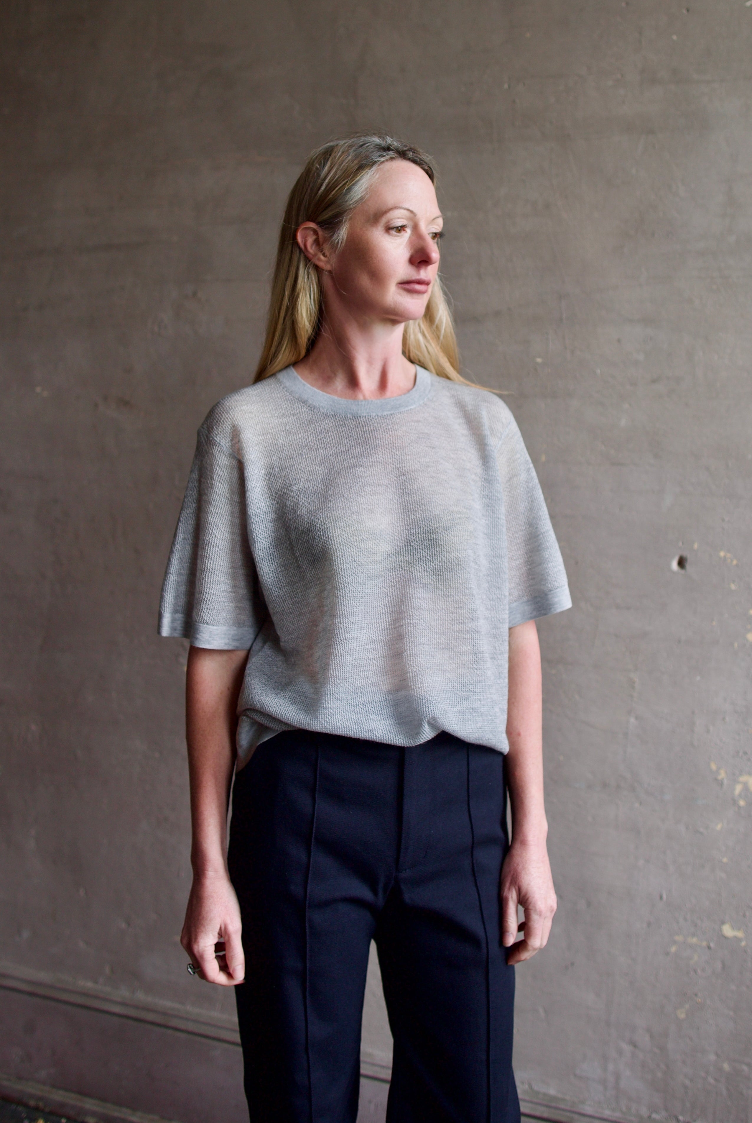 image of a woman wearing the TWP Knit Tee with Pointelle