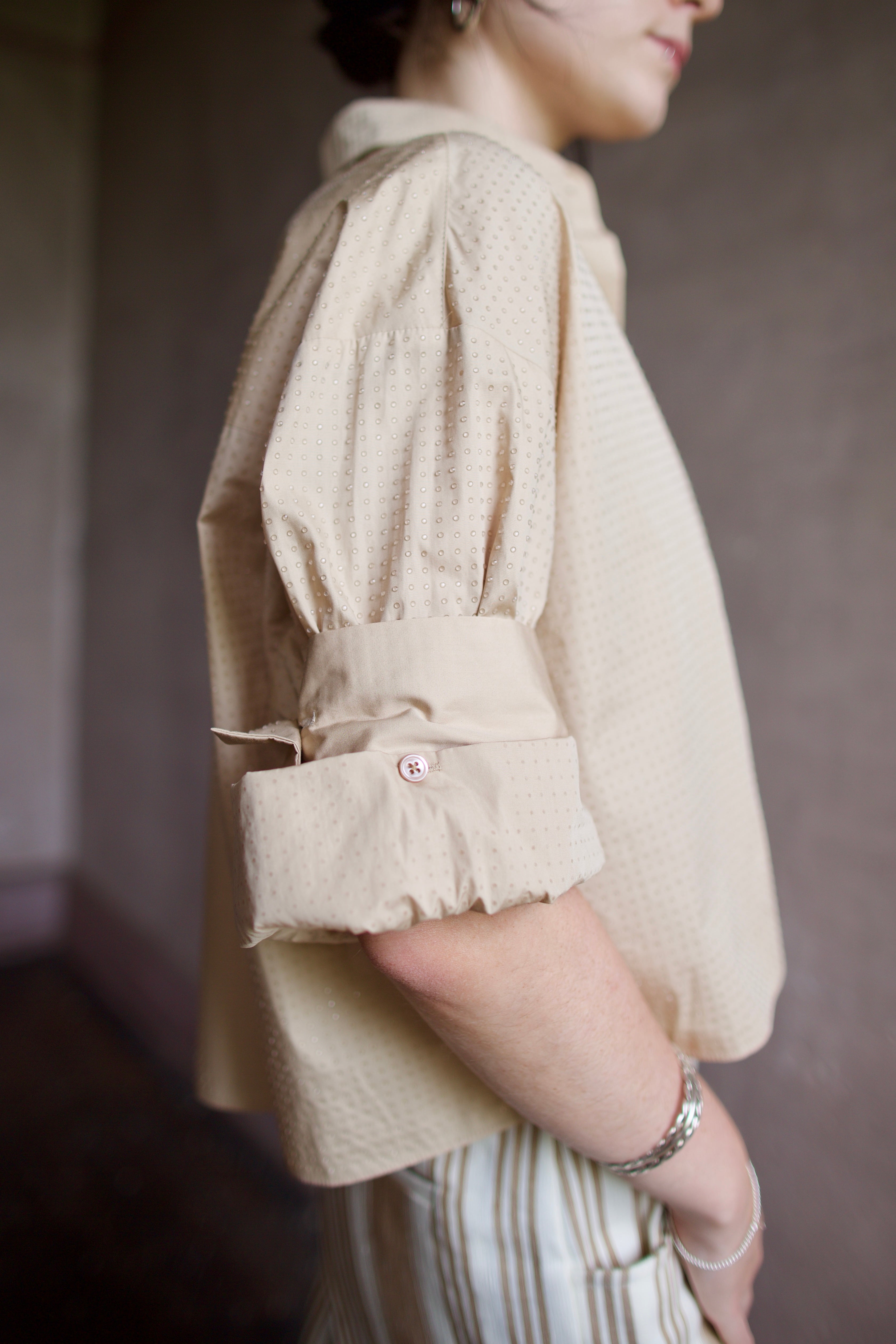 Model wearing luxury designer TWP Next Ex Top with Crystals sophisticated classic that can be worn as a top or elevated layering