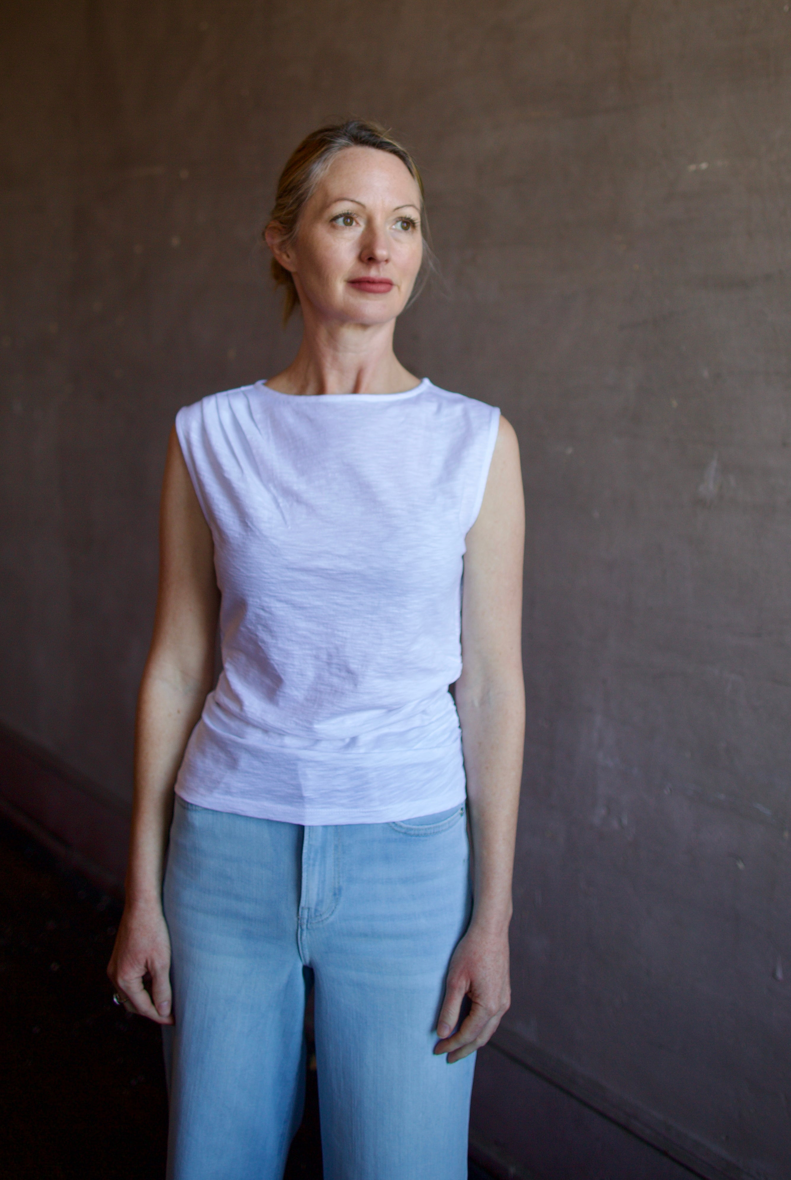 Image of a woman wearing the Veronica Beard Brody Tee and Frame Palazzo Jeans