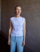 Image of a woman wearing the Veronica Beard Brody Tee and Frame Palazzo Jeans