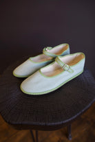 Image of the Vibi Classic Mary Janes in Alicudi colorway that's aqua with green trim with upcycled flexible tire soles comfortable with adjustable hidden snap strap
