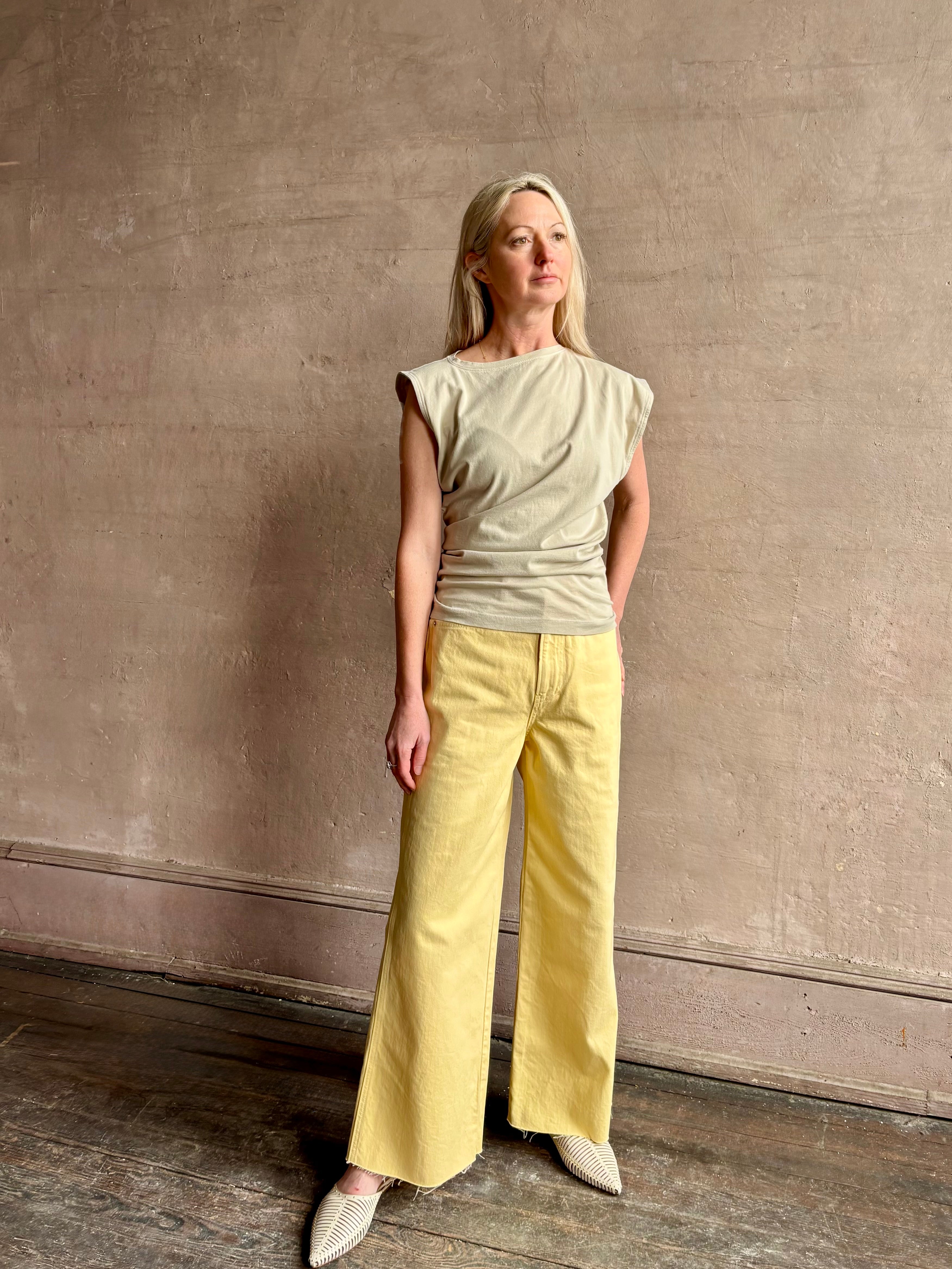 Image of woman wearing - Premium Organic Cotton Luxury Basics AGOLDE Beth Tee in Rice Grass beige with cap sleeves and draping