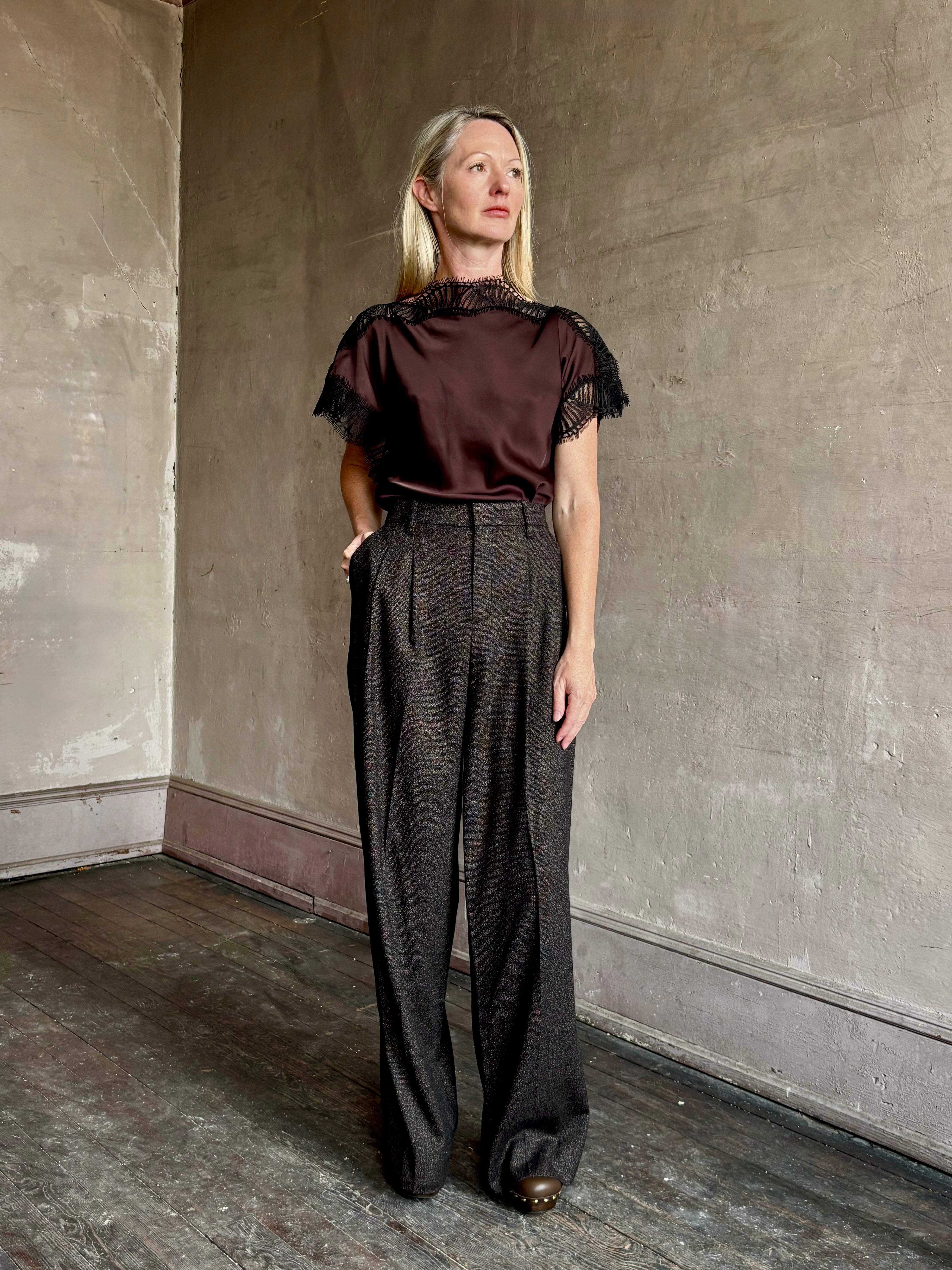 Image of mature woman wearing ALC Luna top in premium chocolate brown viscose blouse with a boat neck short sleeve and refined black lace trim