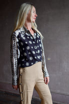 Model wearing an Alix of Bohemia bandana blouse and silk beige Alix trousers