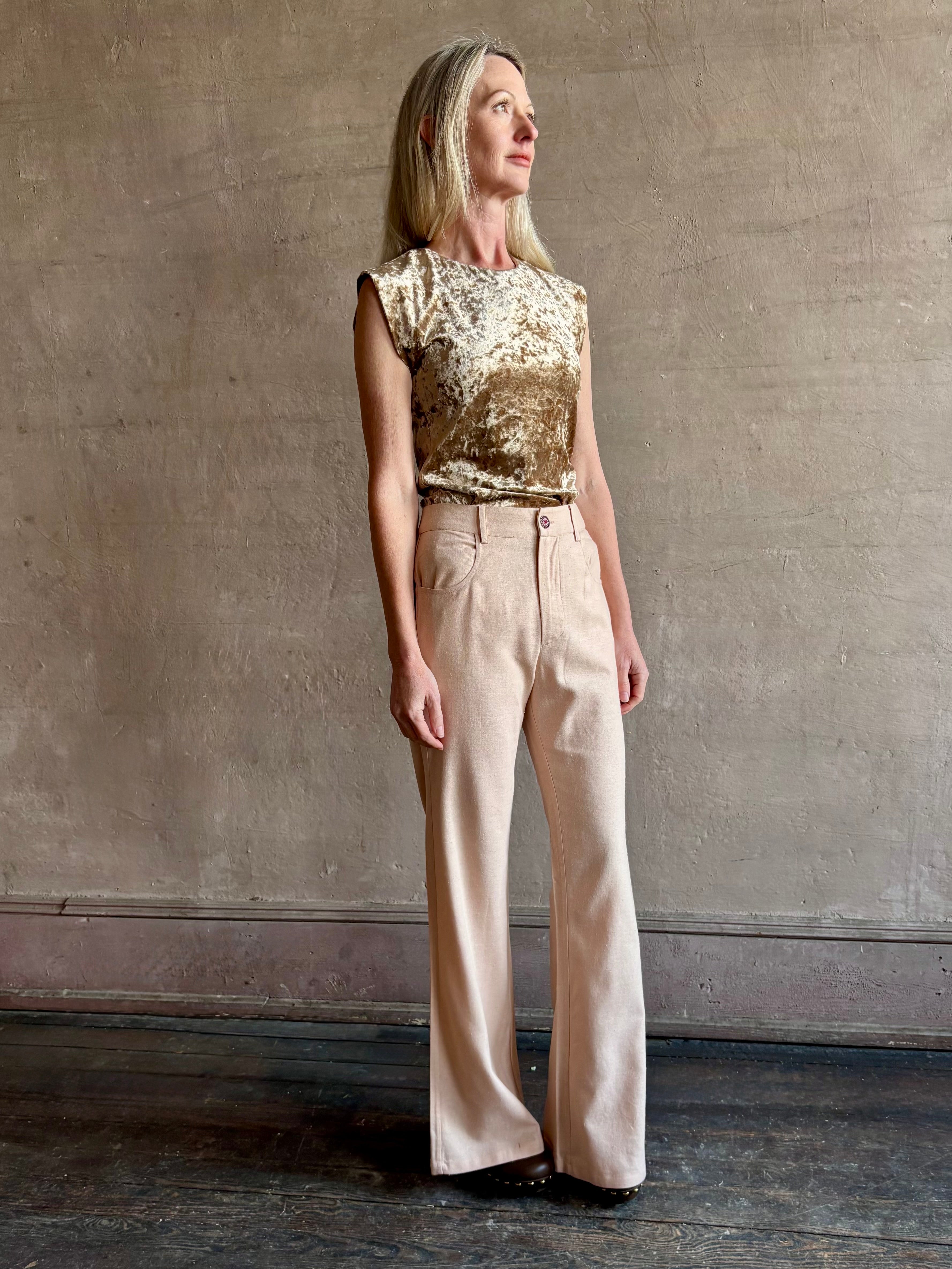 Image of mature woman wearing ALIX OF BOHEMIA elevated casual wear matte silk Bunny Jean in subtle Light Pink Blush tone