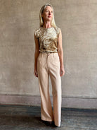 Image of woman wearing ALIX OF BOHEMIA elevated casual wear matte silk Bunny Jean with hand-made pottery button