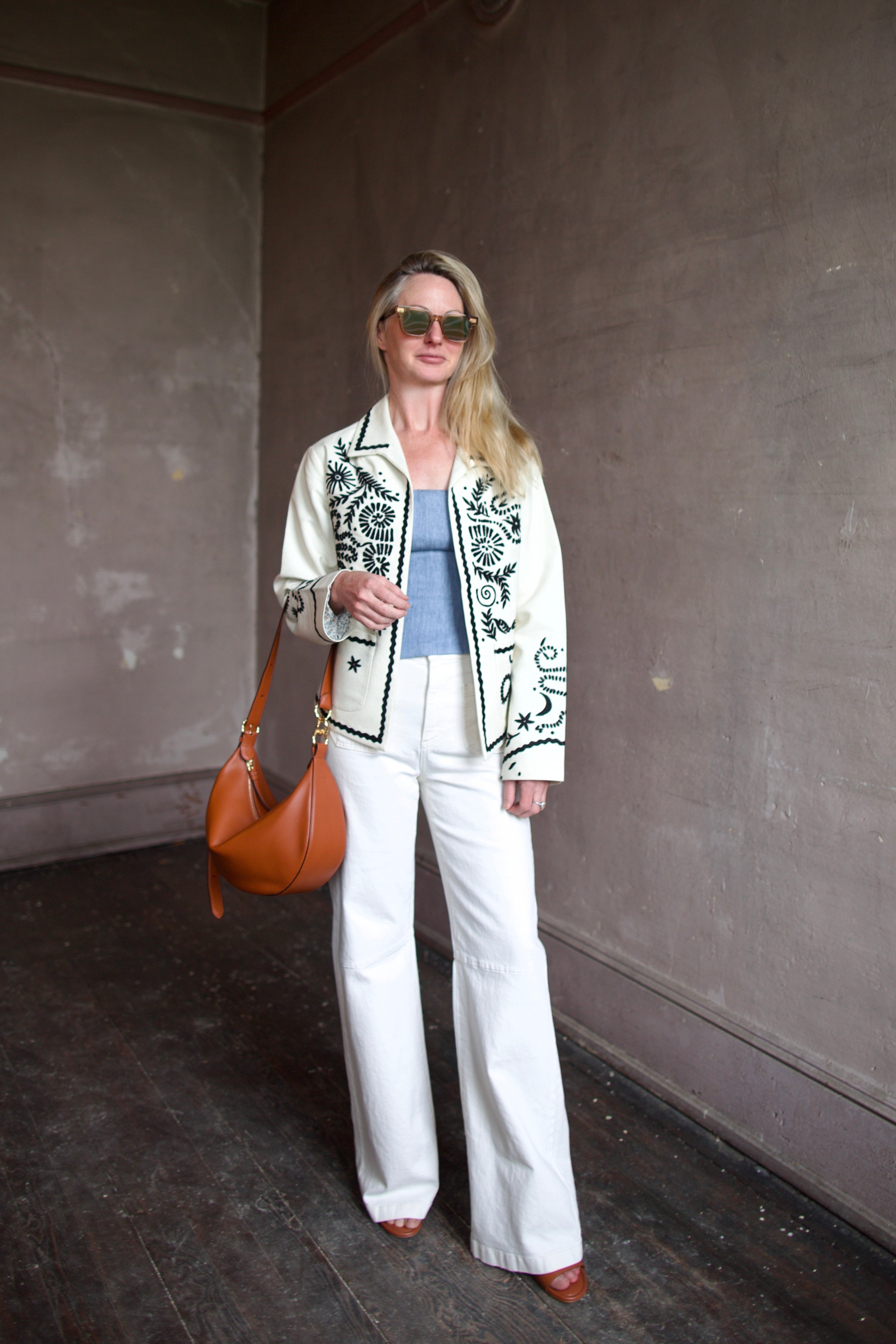 Mature woman wearing the Alix of Bohemia Francis Bone Snake Jacket in black and white colorway with luxury 100% silk fabric and Bohemian 