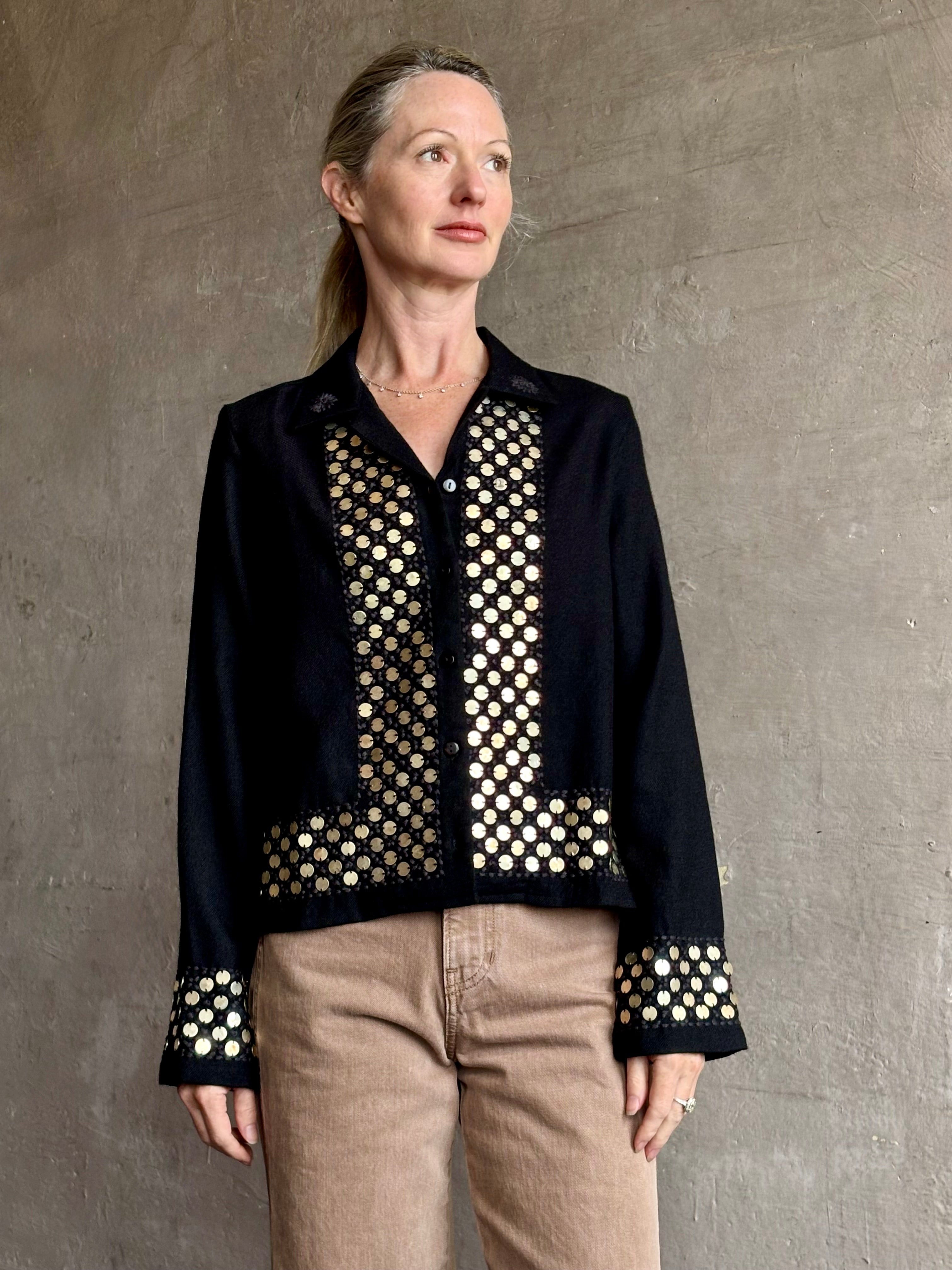 Image of woman wearing Alix of Bohemia premium wool  Pippa Spur button down Shirt with brass coin embellishments down front, bottom and sleeves
